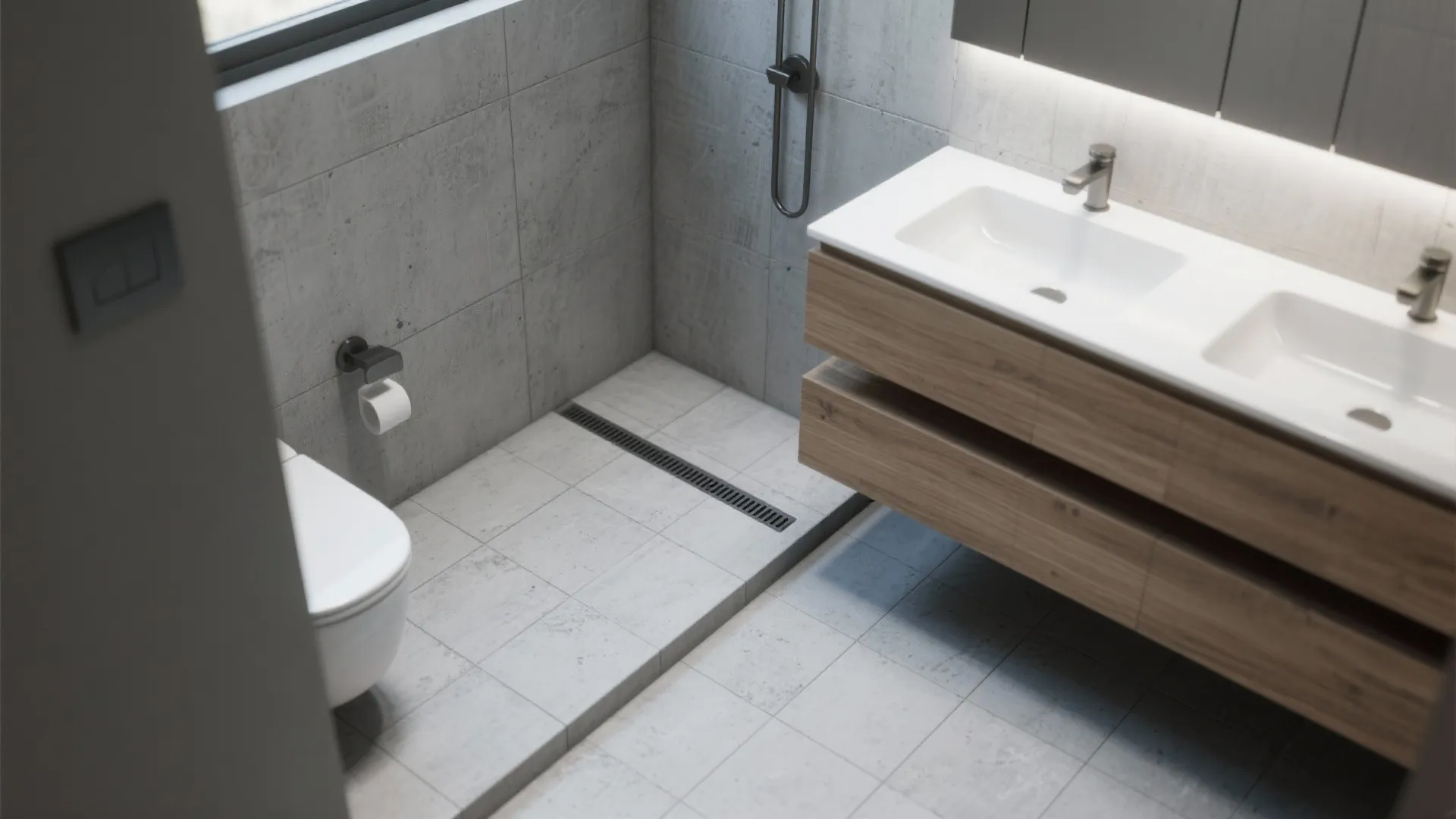 Top-down view of 24x24 matte cement-look tiles sloped to a wall linear drain with minimal grout lines.