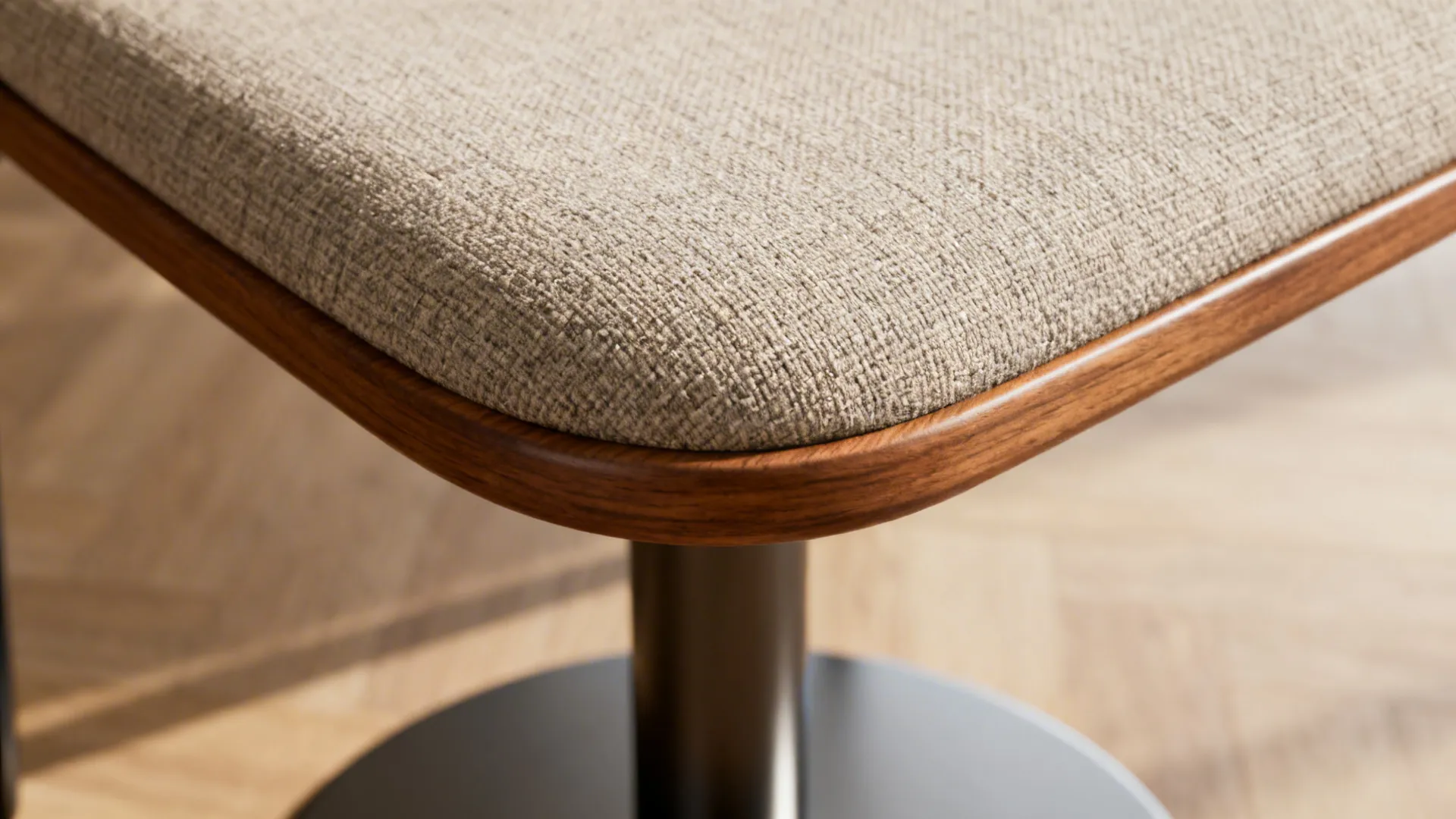 Macro detail of armless dining chair and table edge showing ergonomic clearances and textures.