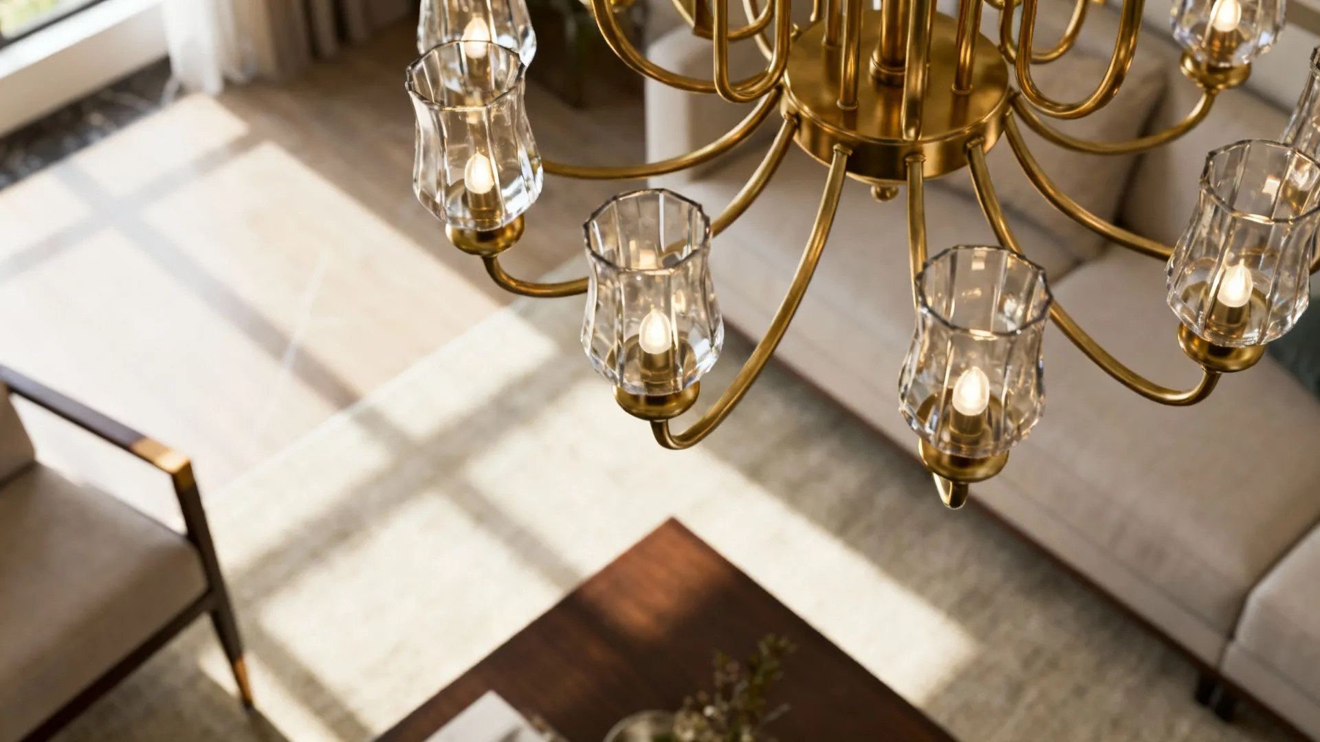 Close view of chandelier positioned 30–36 inches above a coffee table in a living room