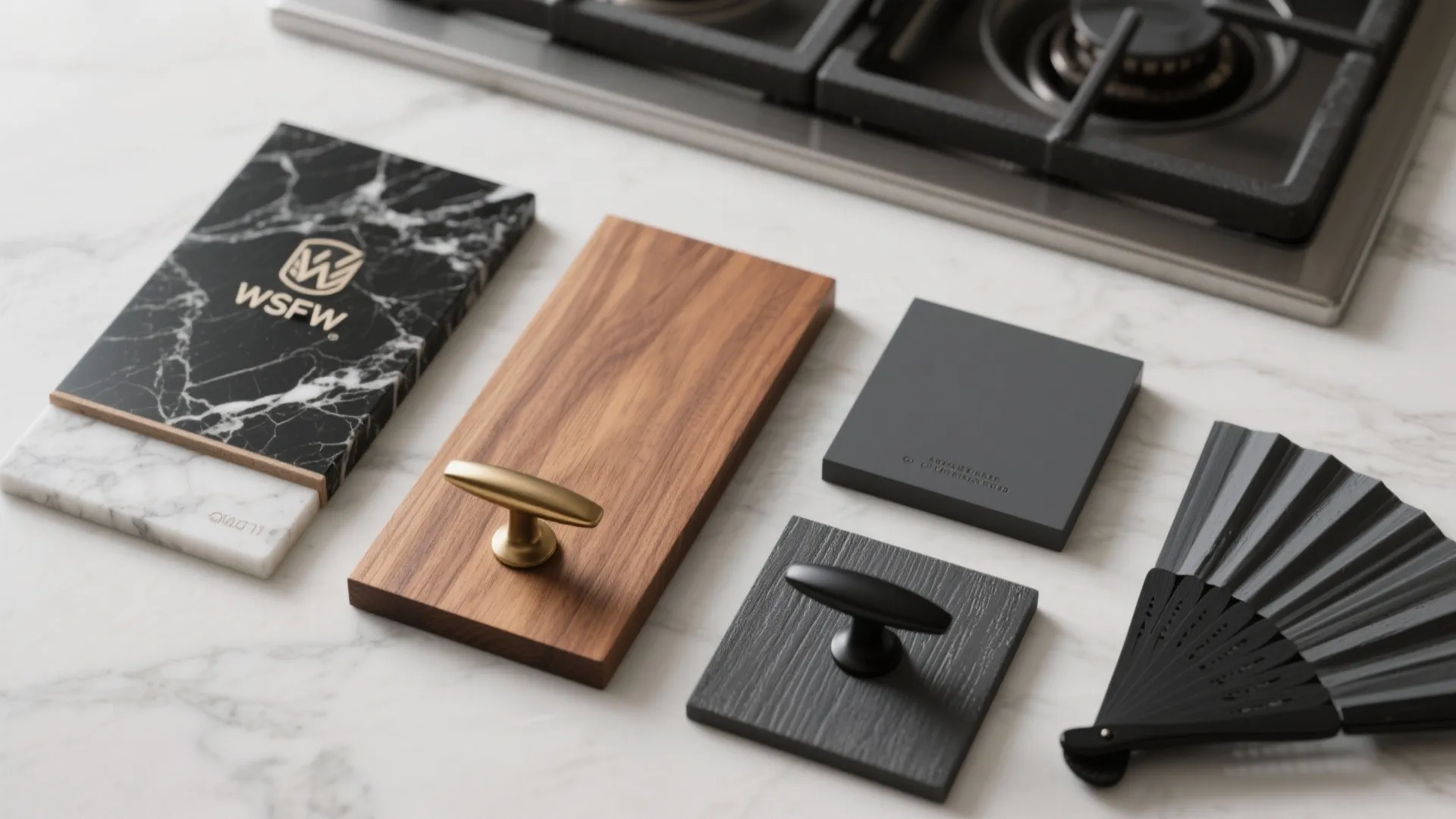 Material samples showing marble-look quartz, butcher block, and hardware options paired with charcoal paint fan.