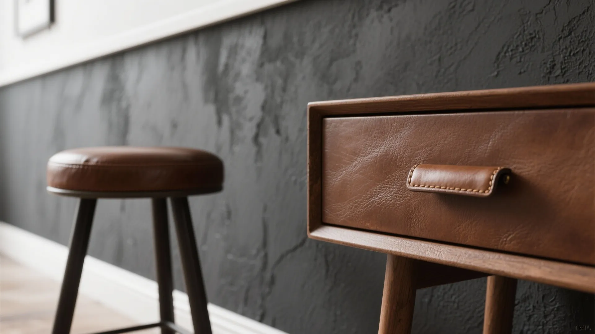 2. Matte charcoal + brown leather accents