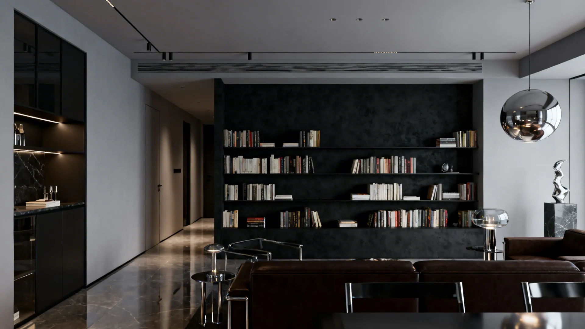 Modern apartment with charcoal accent wall, pale gray surroundings, and dark brown furniture with metallic accents.