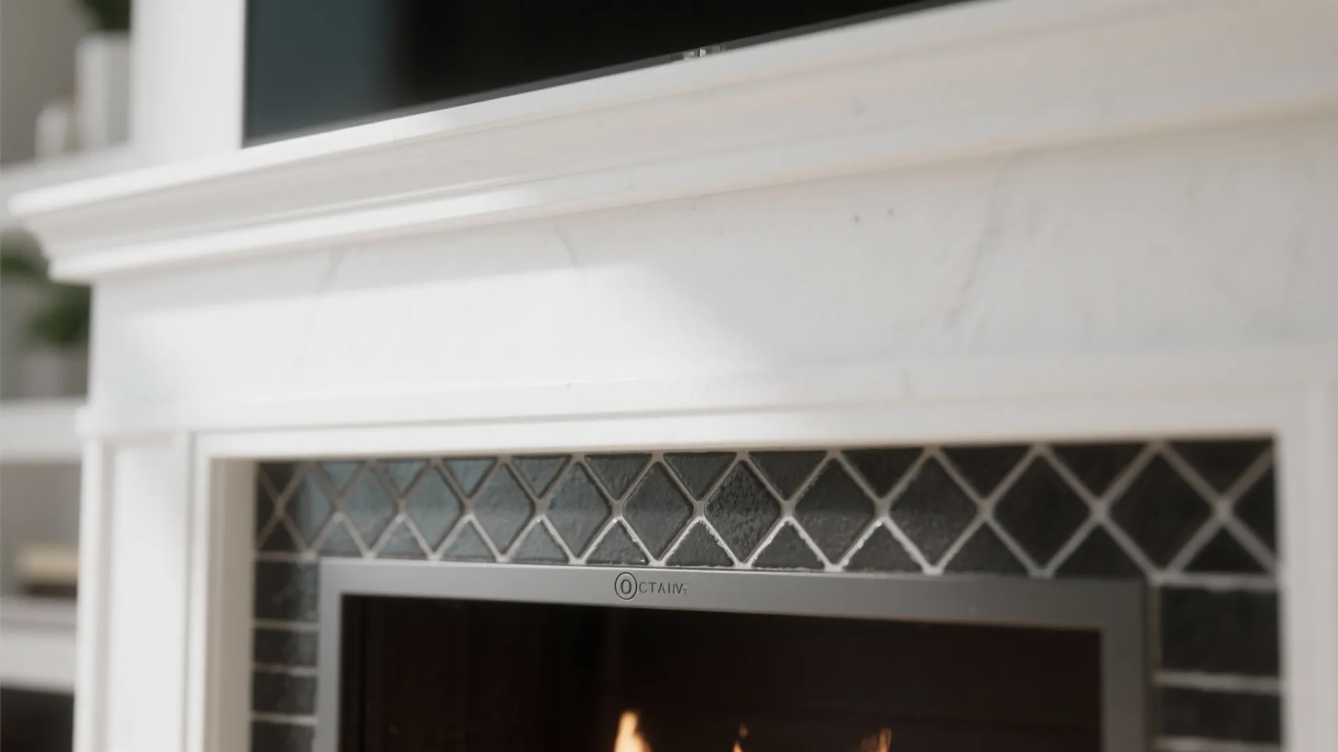 White fireplace with charcoal hex tile outline and dark grout for architectural definition.