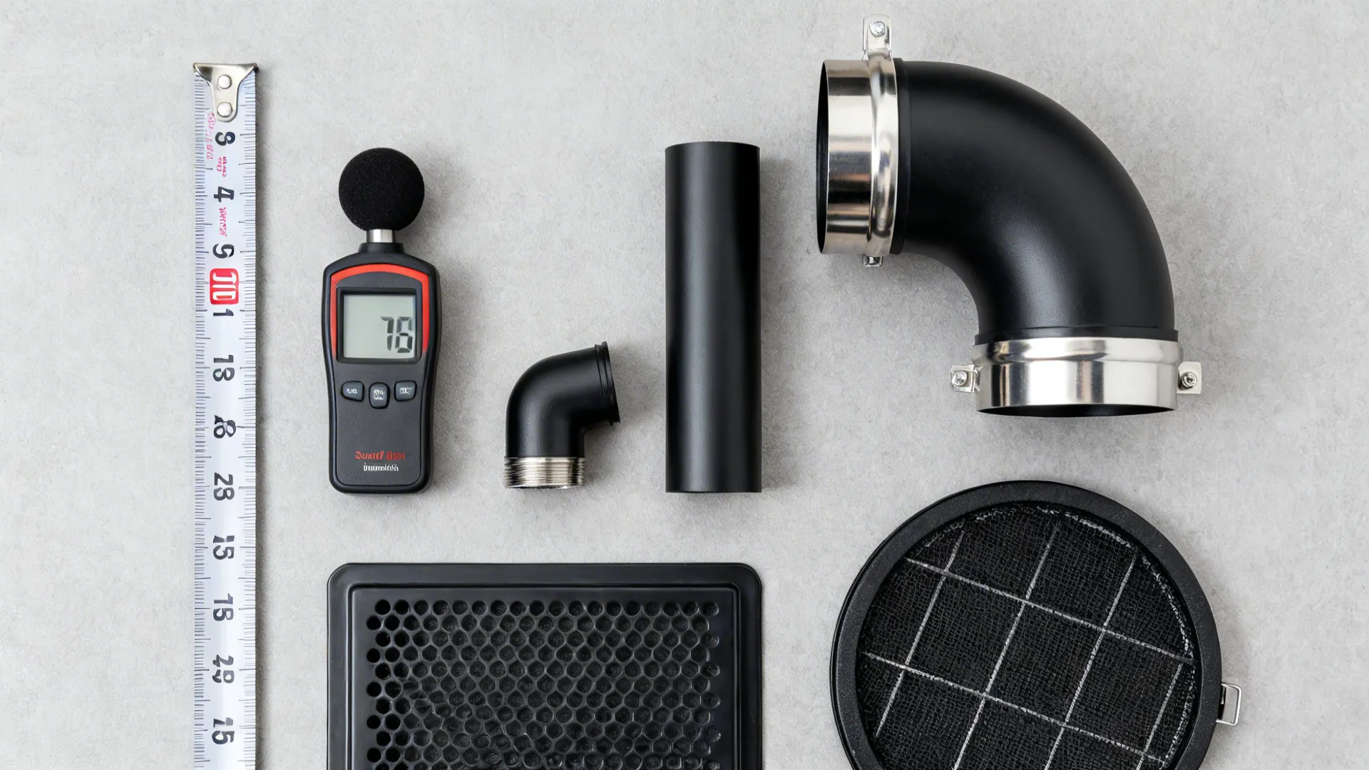 Flat lay of tape measure, sound meter, ducts, and filters illustrating chimney choices.