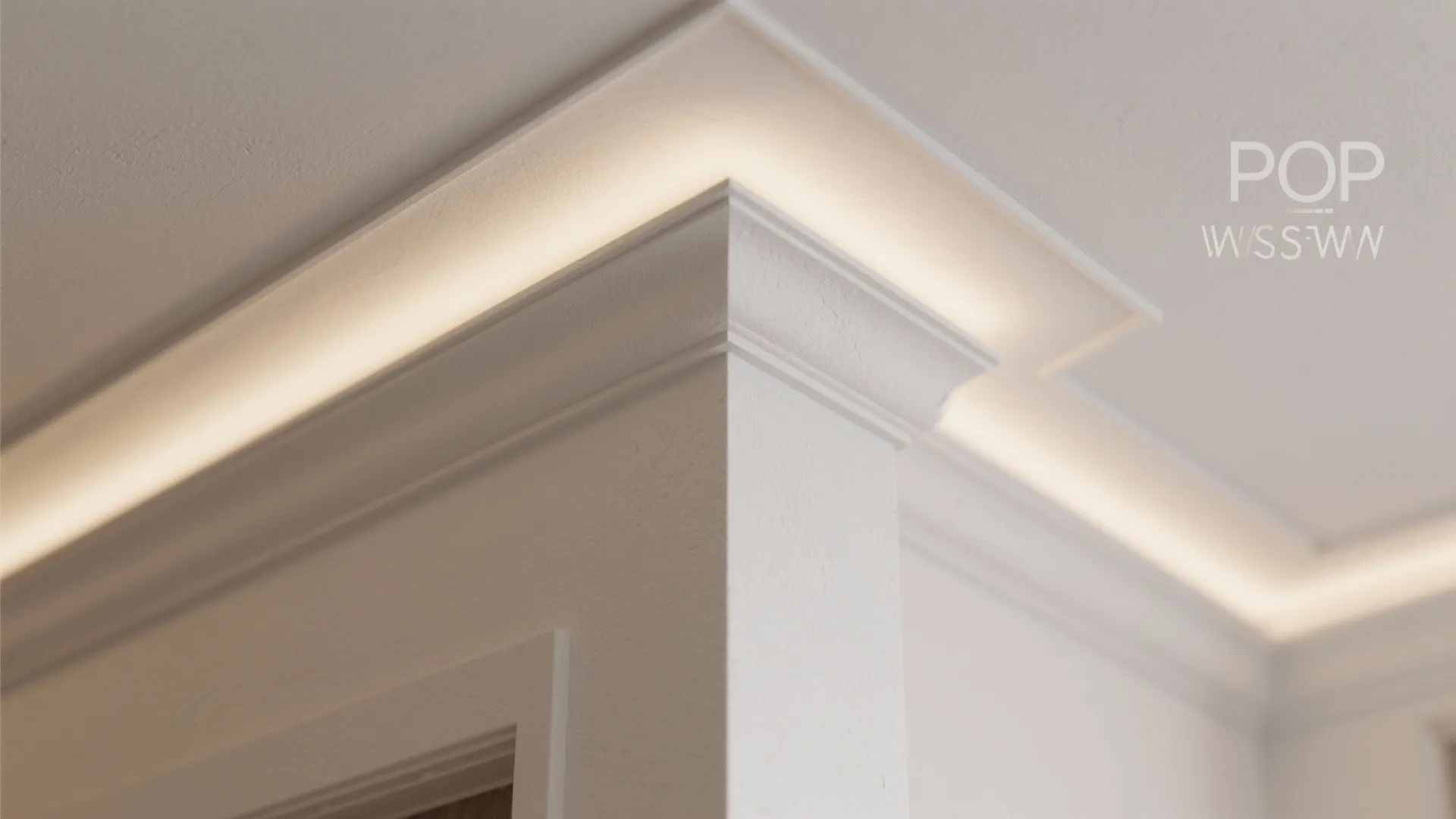 Close up of white wall panel on ceiling with hidden warm light fixture for modern interior
