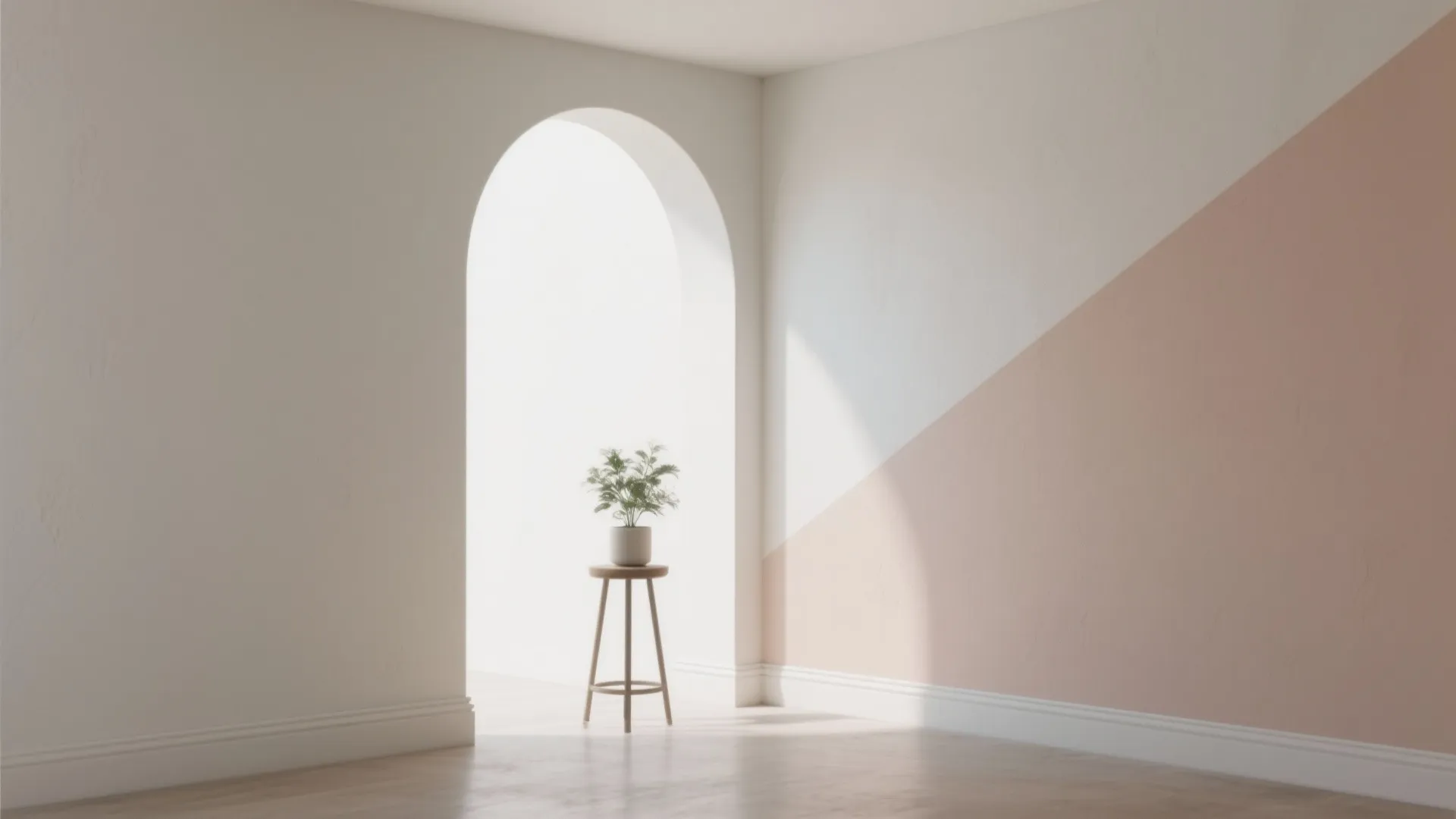 Minimalist room with white and pink wall paint arch doorway and small plant on stool