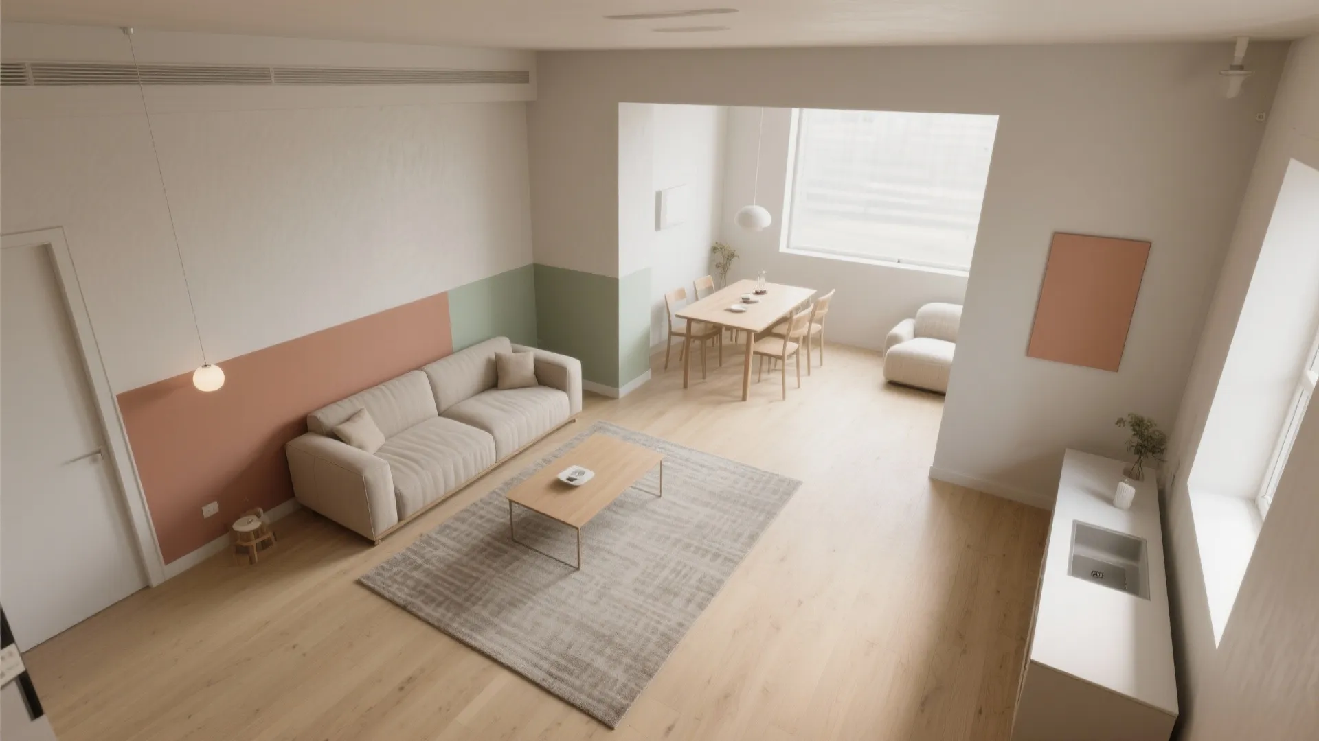 Modern open plan living room with cream sofa wood floor pink and green wall paint