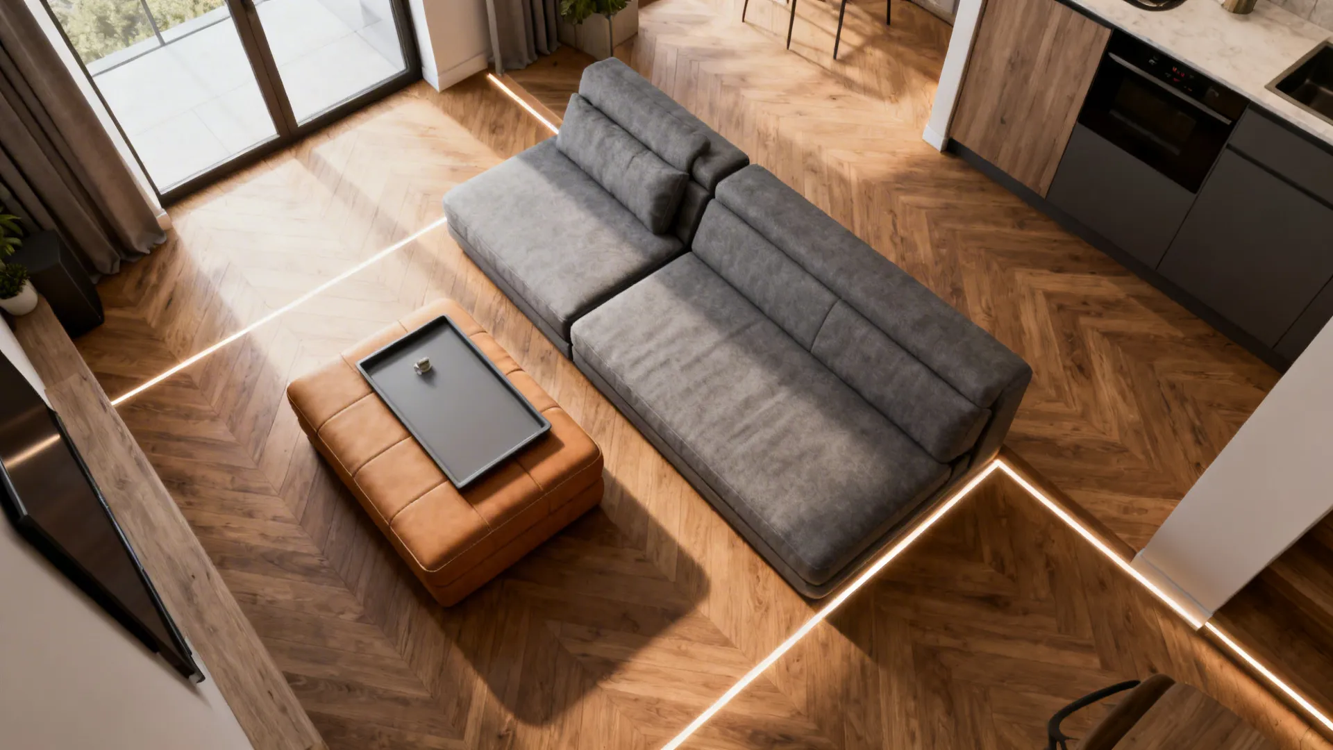 Top view of a modern living room featuring grey sofa tan footrest and wooden floor