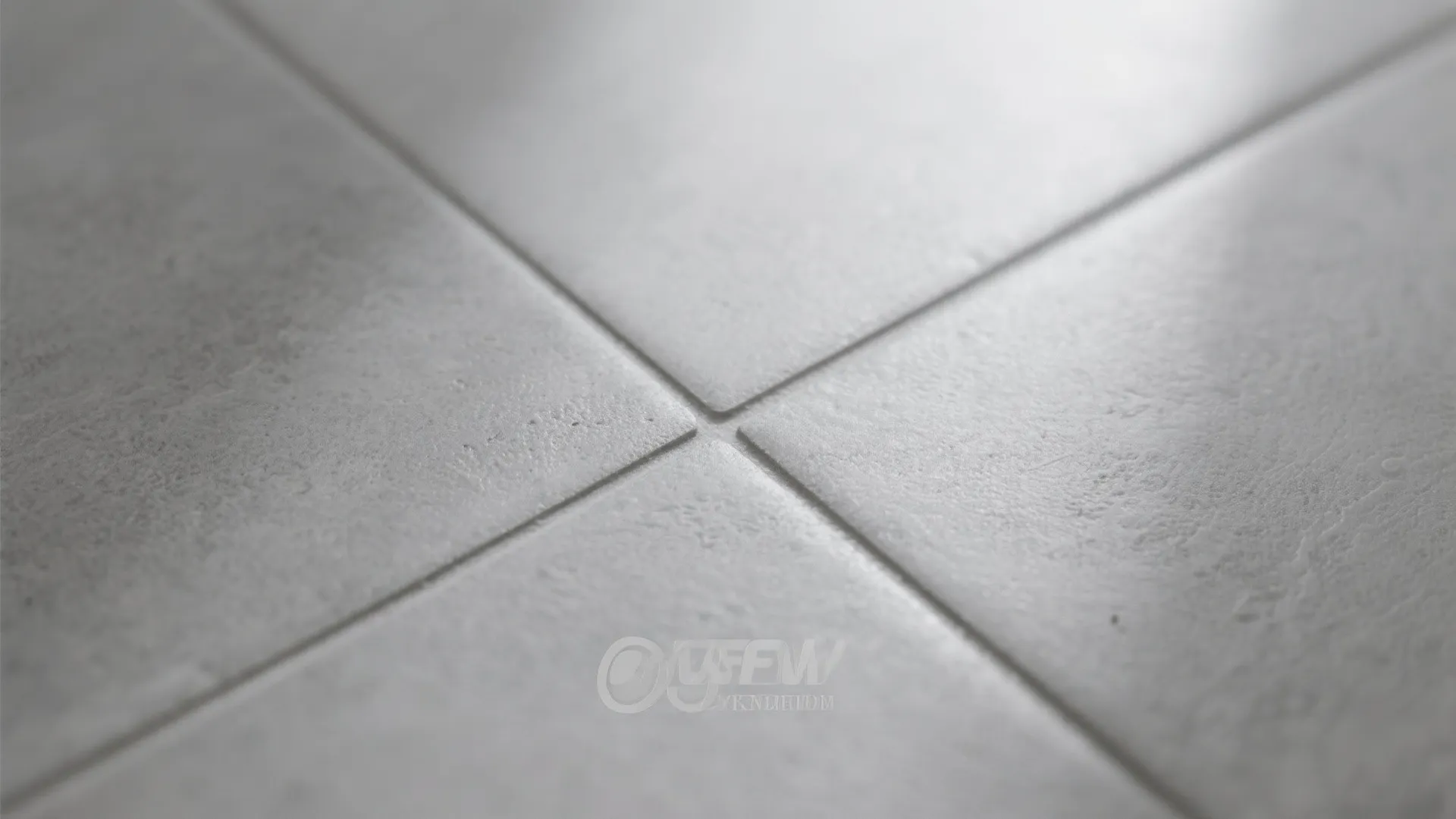 Close up view of light grey square floor tiles with thin grout lines and smooth texture