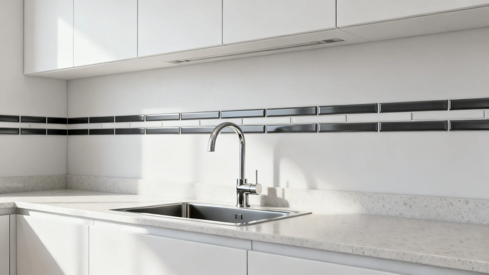 Small galley kitchen with a slim charcoal tile stripe above the counter creating a clean focal line.