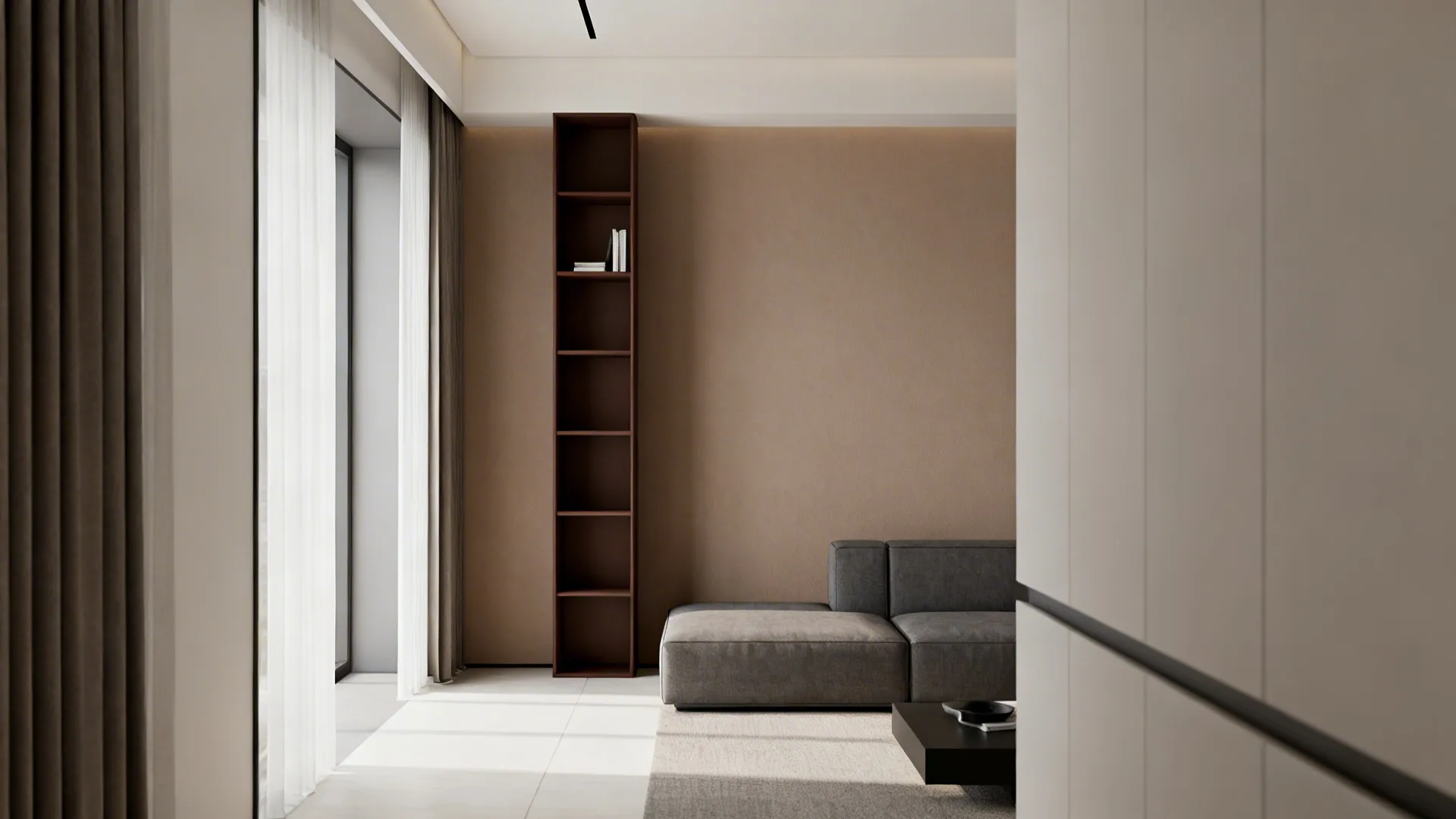 Minimalist living room design with grey sofa, tall wooden bookshelf, beige wall, and white curtains