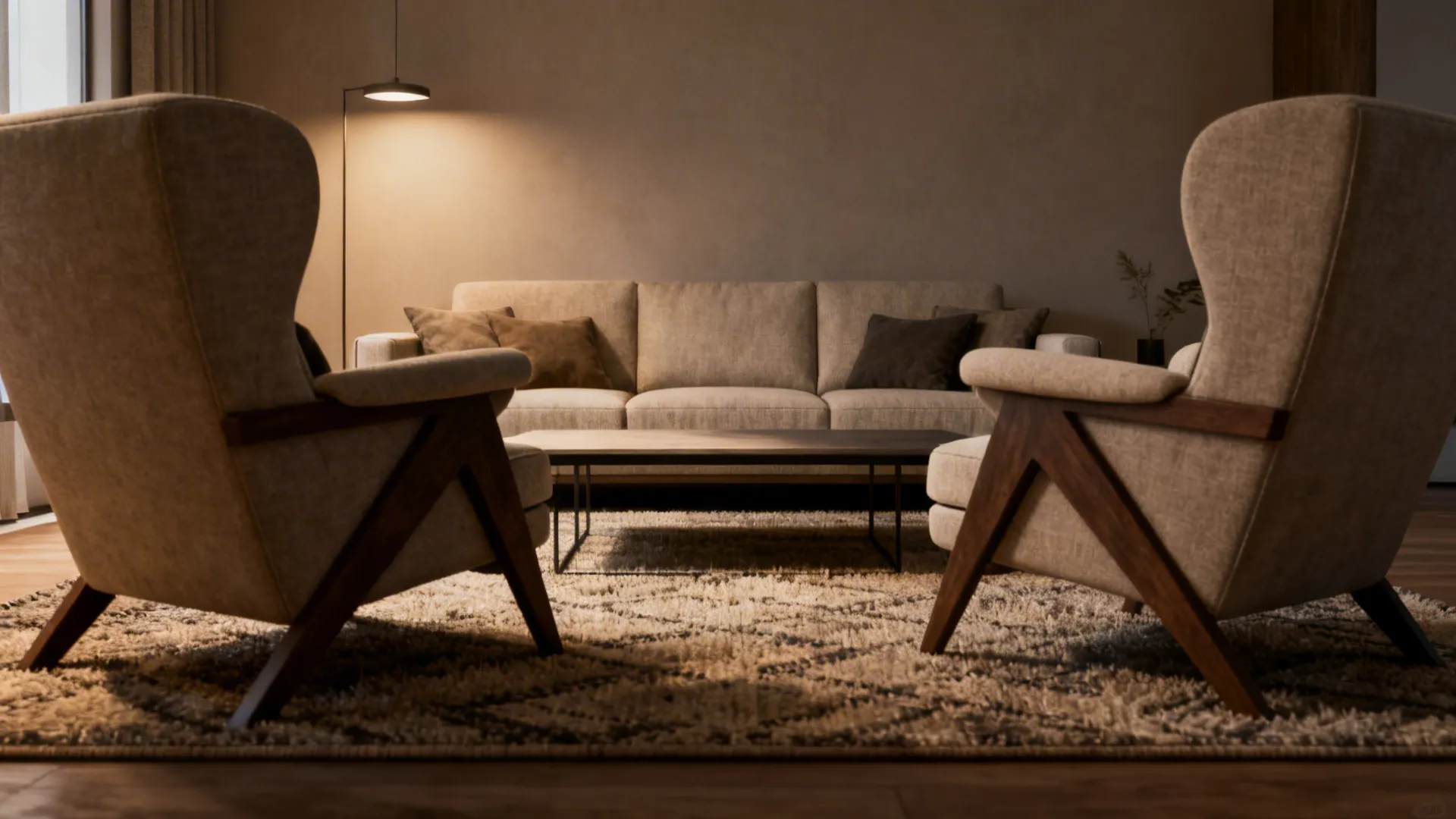 Intimate conversation area with sofa, two armchairs and a low coffee table, angled chair for walkway