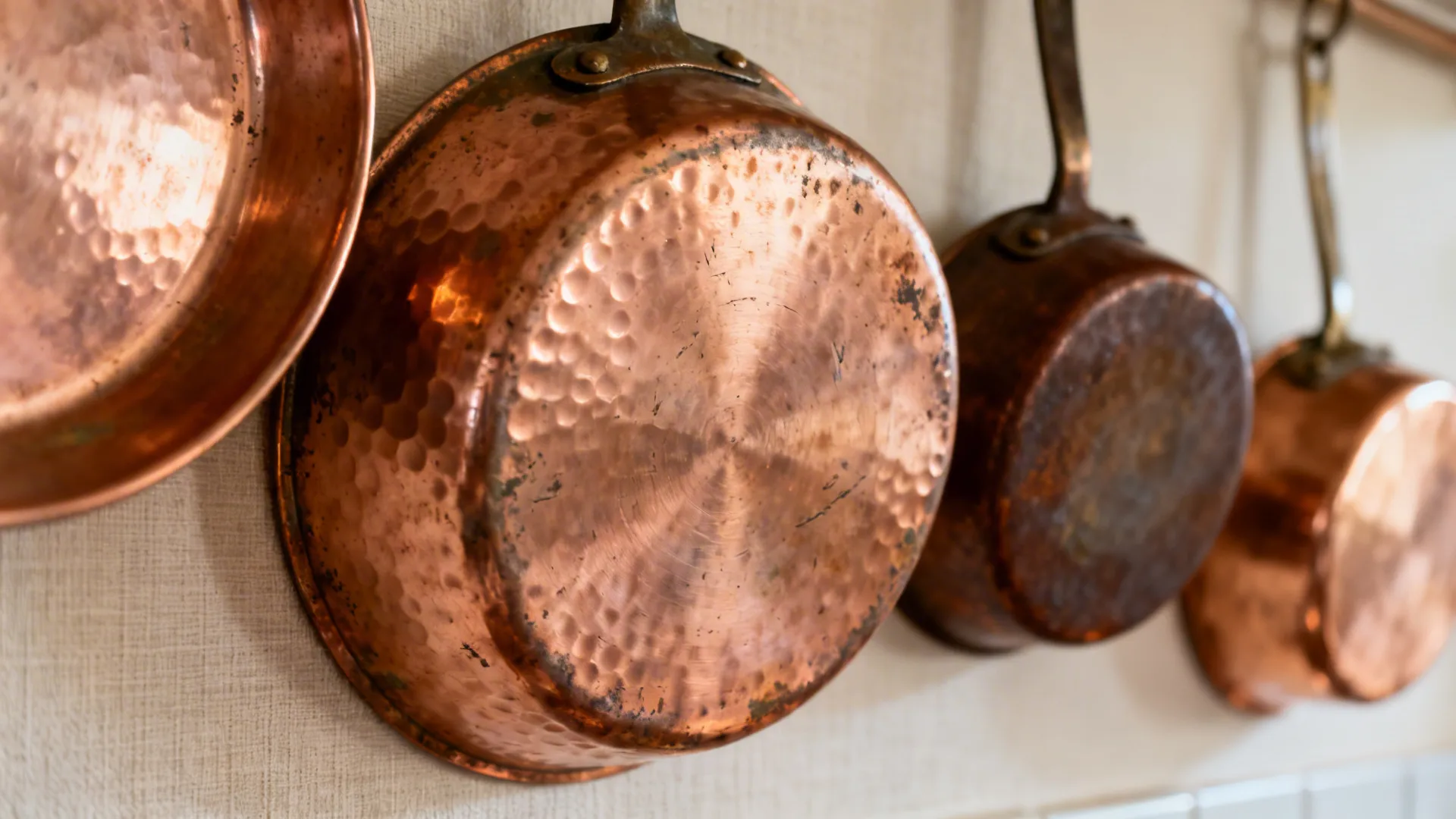 Patina-Rich Copper Plates as a Gallery Wall