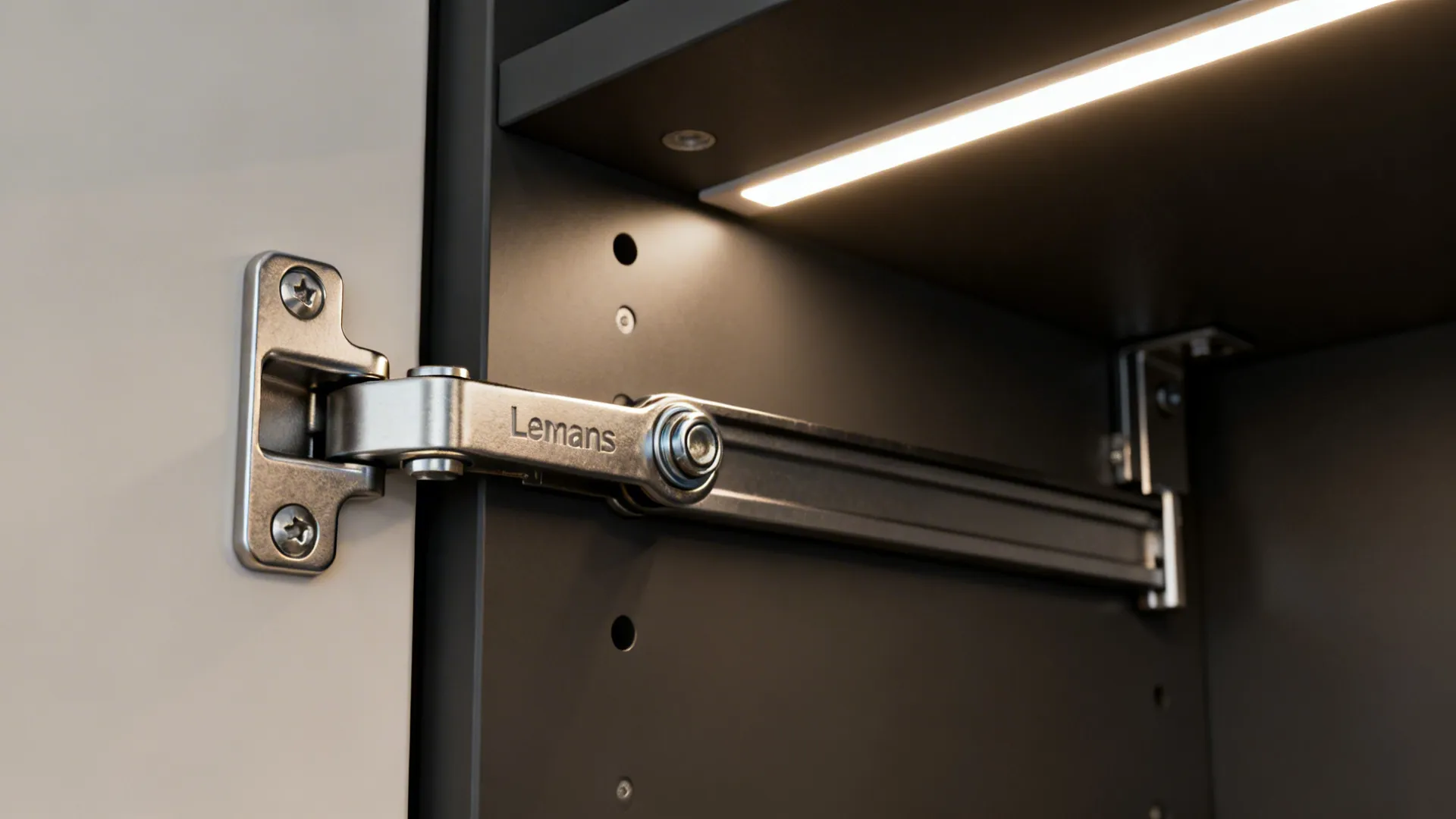 Close-up of LeMans corner pull-out hardware pivot and arm with smooth bearings.