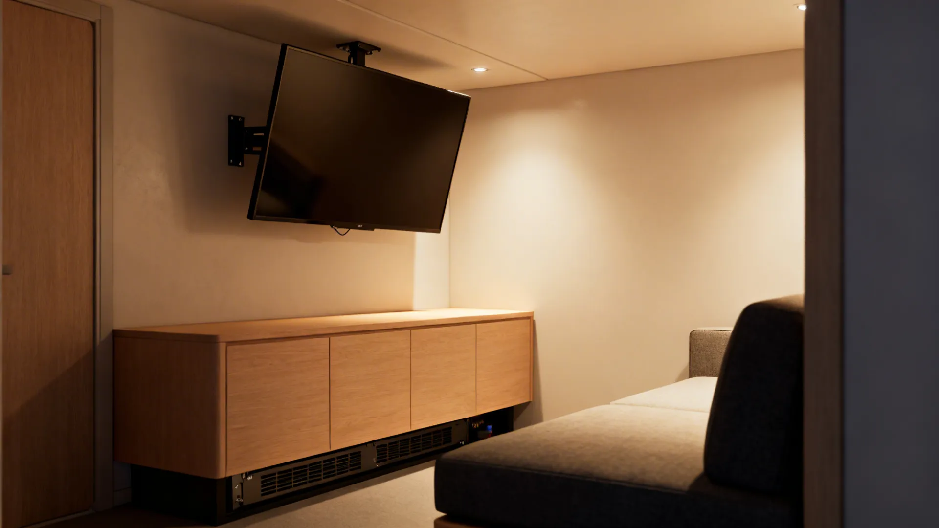 Corner-mounted TV on a pivot arm above a low cabinet in a small living room