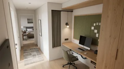 Compact Home Office Nook with Wooden Desk and Green Accent