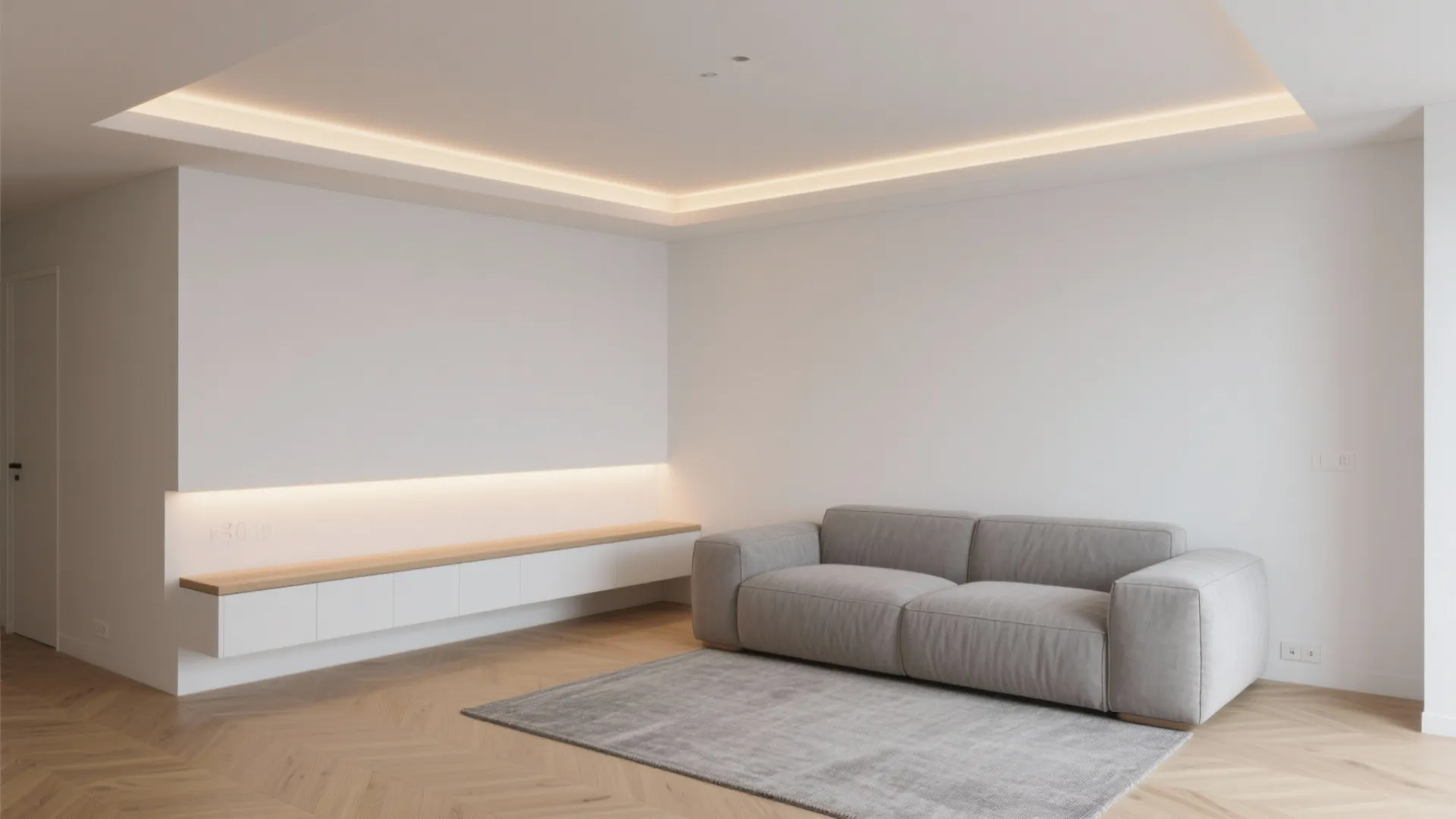 Minimalist living room featuring grey sofa white cabinet wooden floor and hidden warm ceiling light