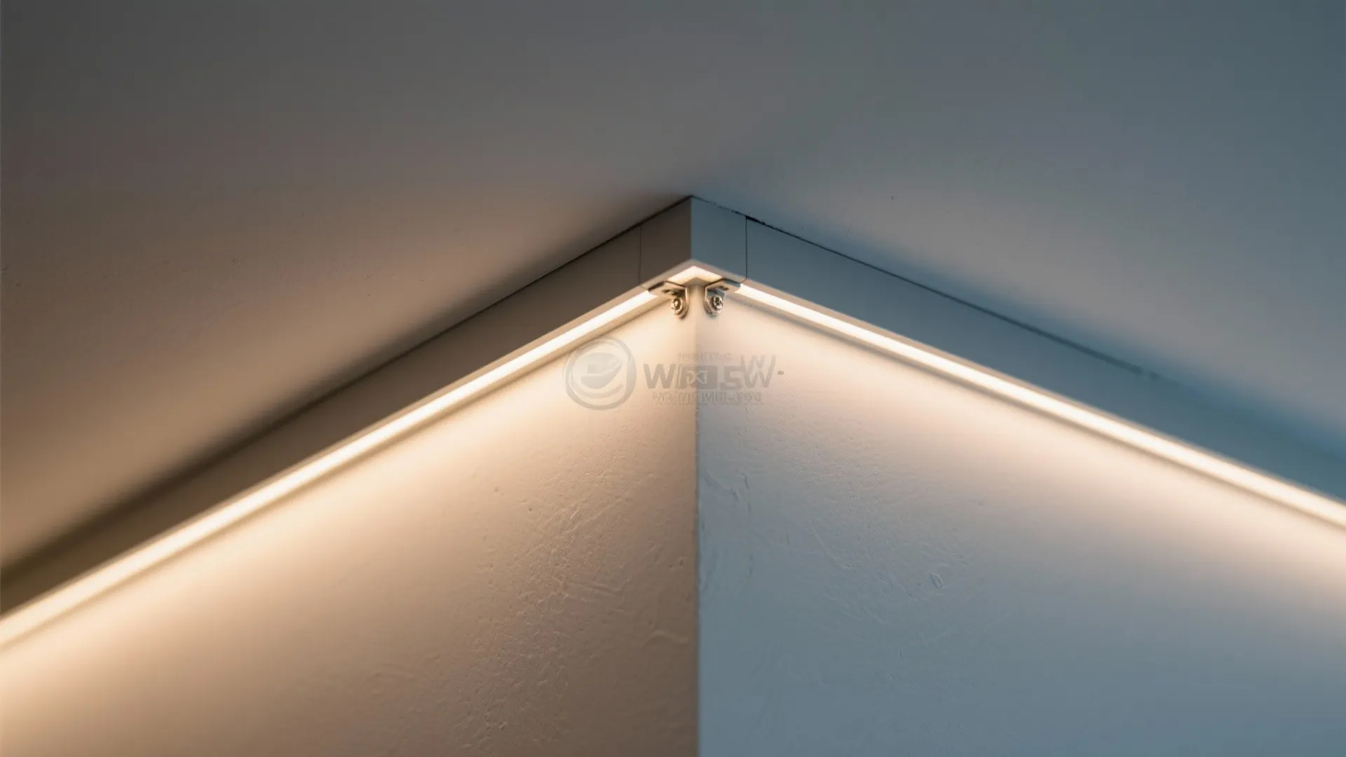 Close up view of warm strip lights installed along the ceiling corner for modern home lighting