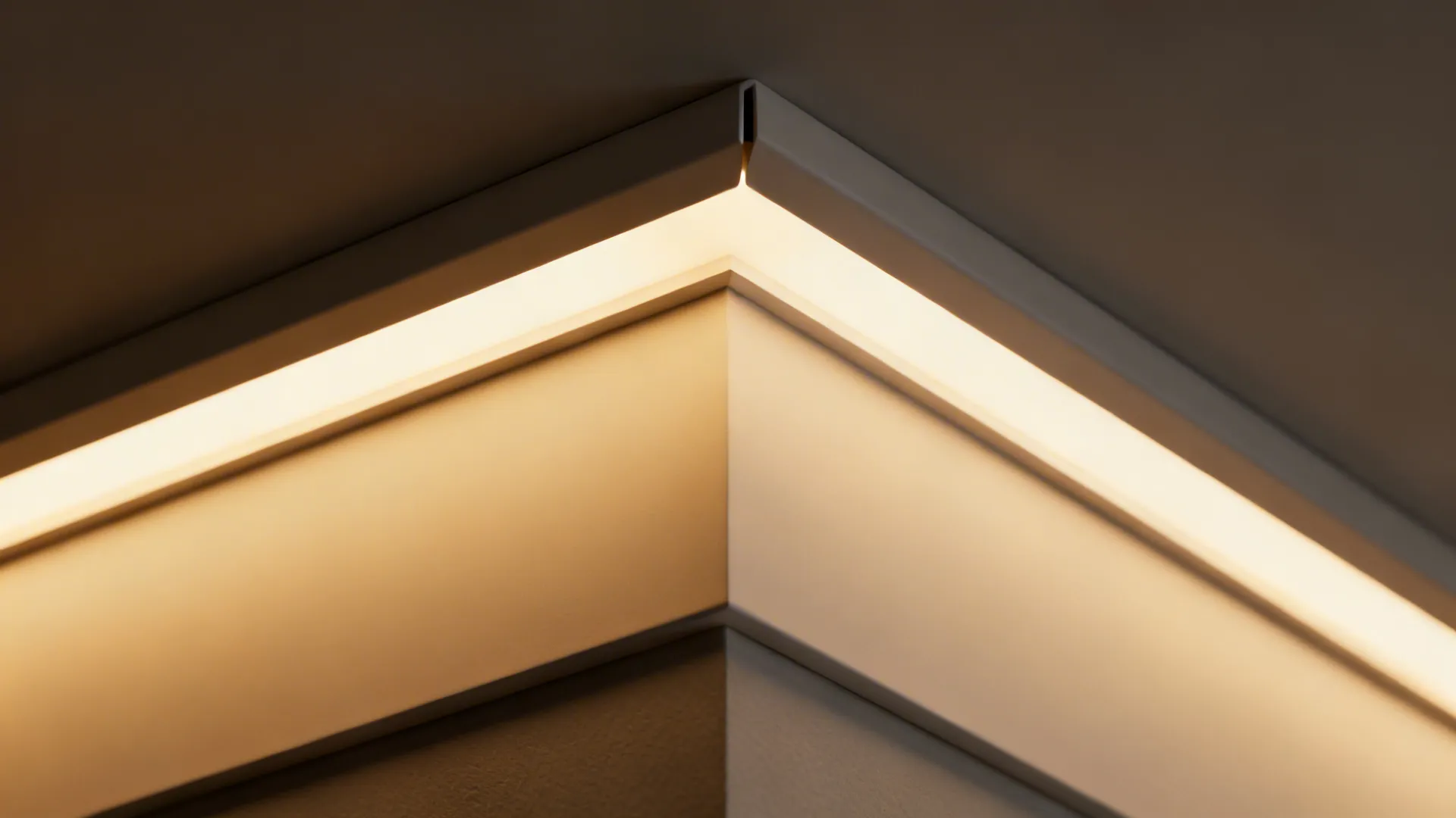 Macro of a PVC cove profile showing clean miter and evenly diffused warm LED.