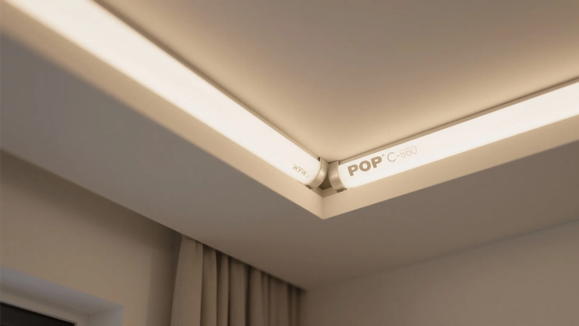 Close up of linear light fixture installed inside a white recessed ceiling for modern interior