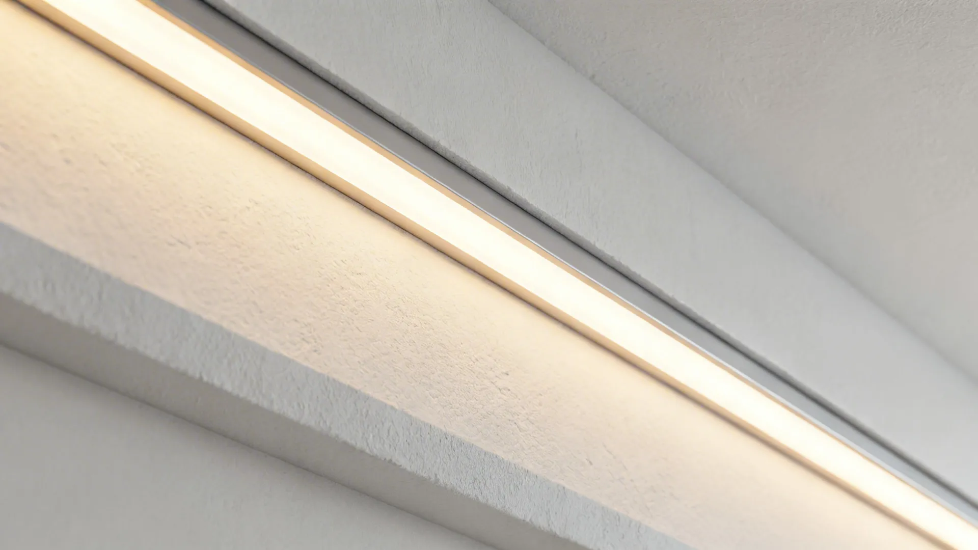 Macro of LED cove channel with opal diffuser creating an even warm glow