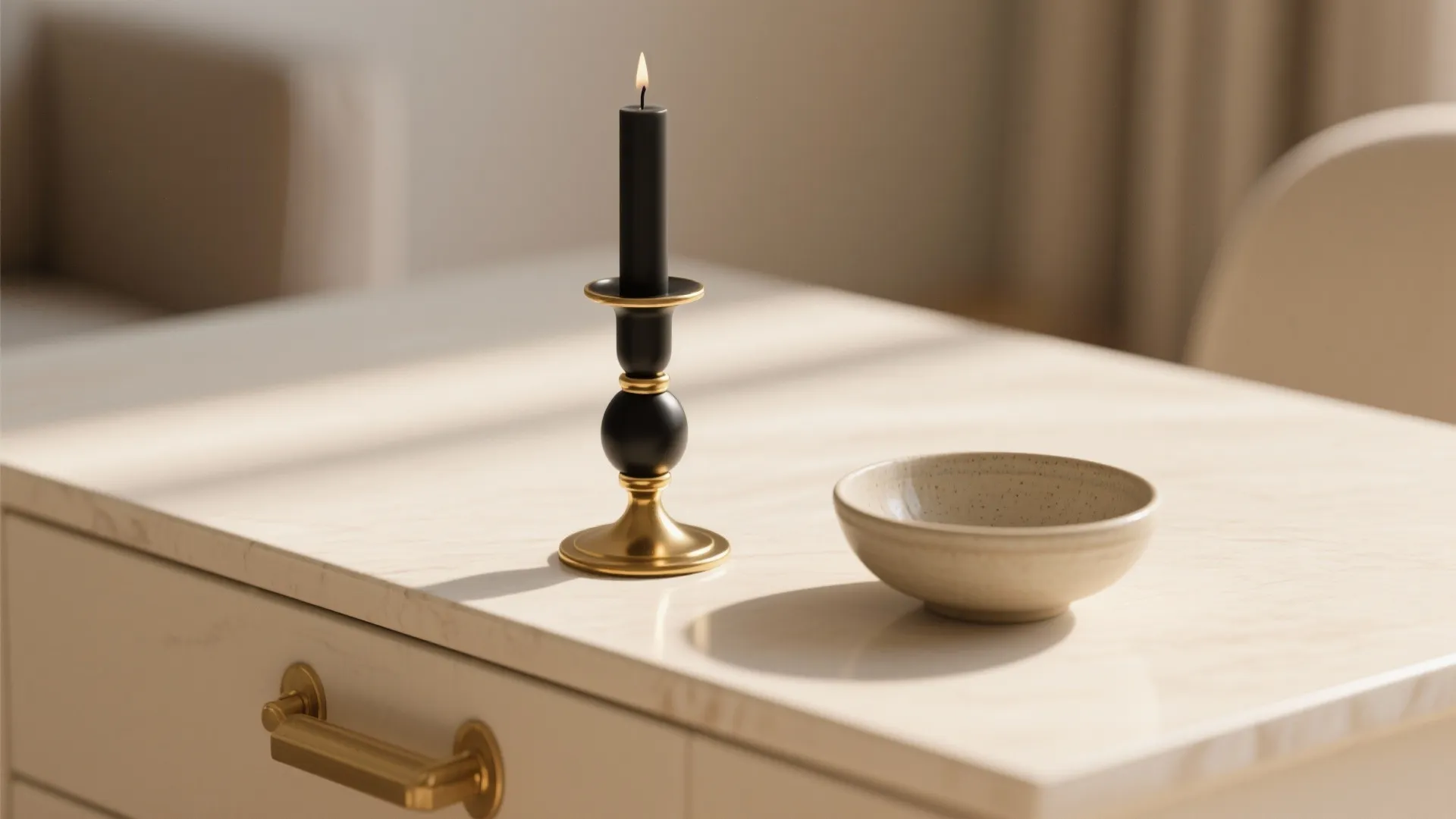 Monochrome cream tabletop with brass hardware and matte black accent pieces.