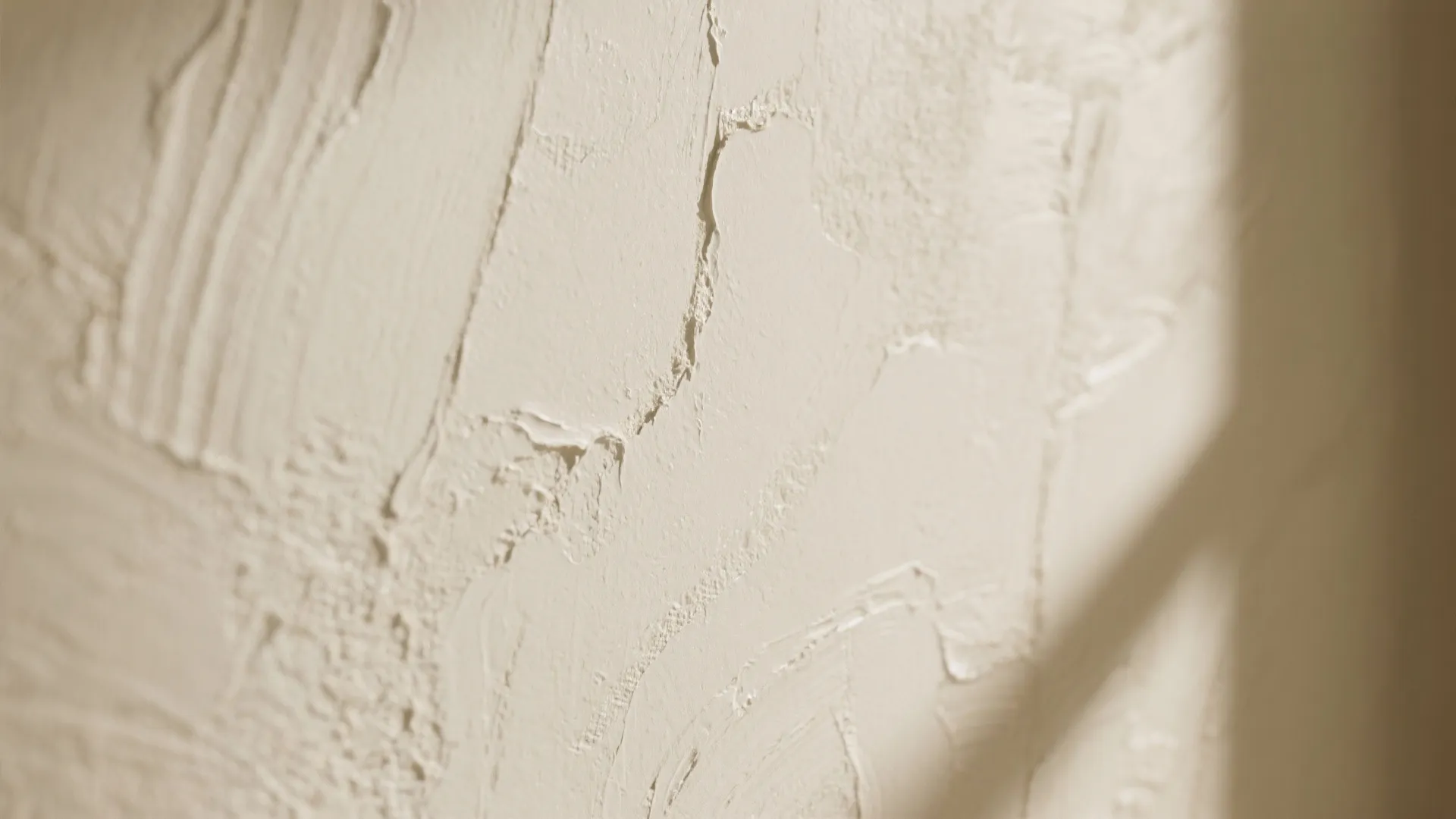 4. Textured cream finishes: plaster, limewash, or subtle glaze