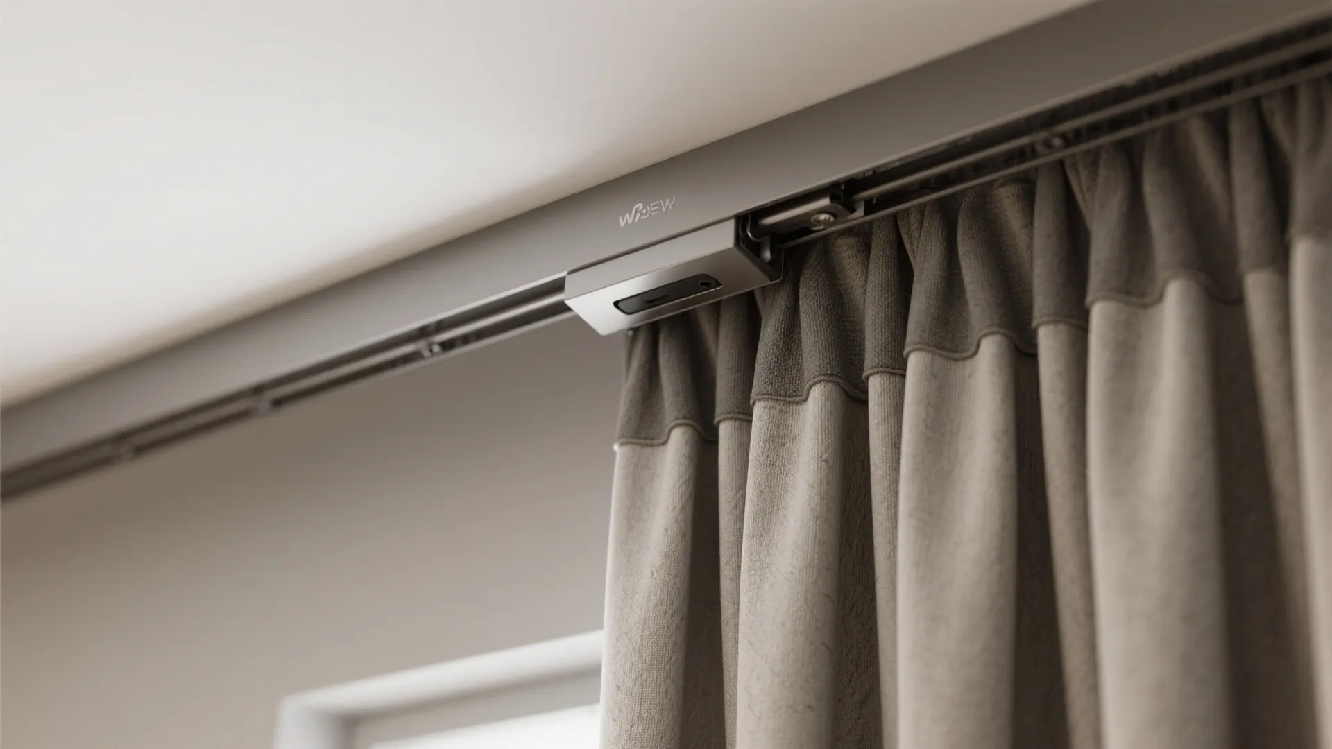 4. Choose practical hardware: tracks, blackout liners, or motorized options