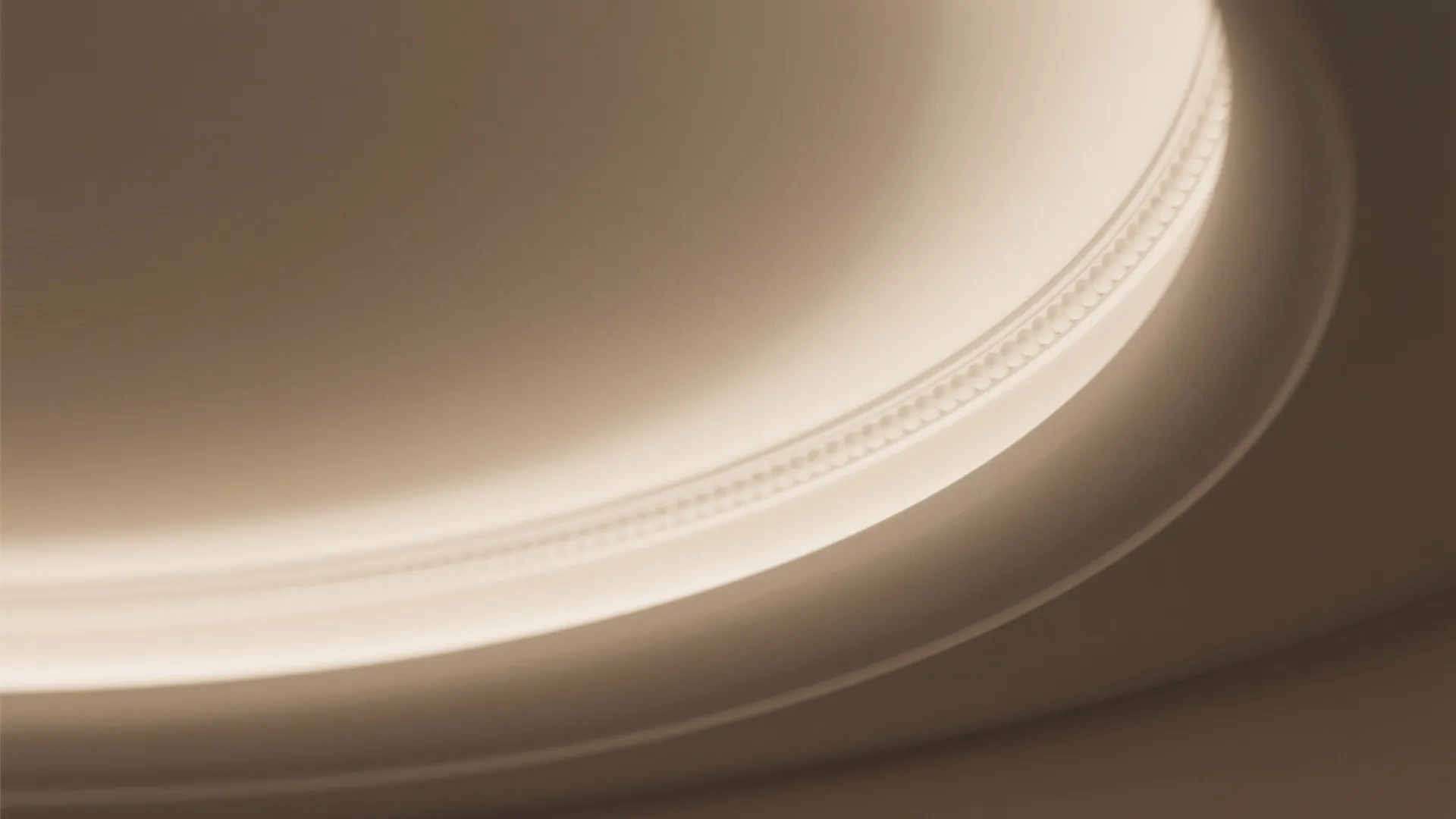 Curved Gypsum Canopy to Define the Table Zone