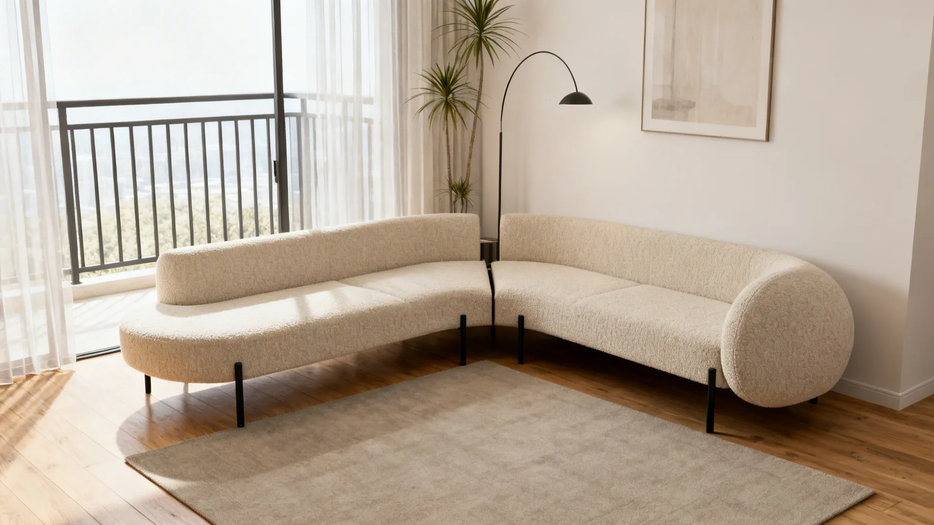 Curved modular sectional in a small living room creating smooth traffic flow to a balcony.