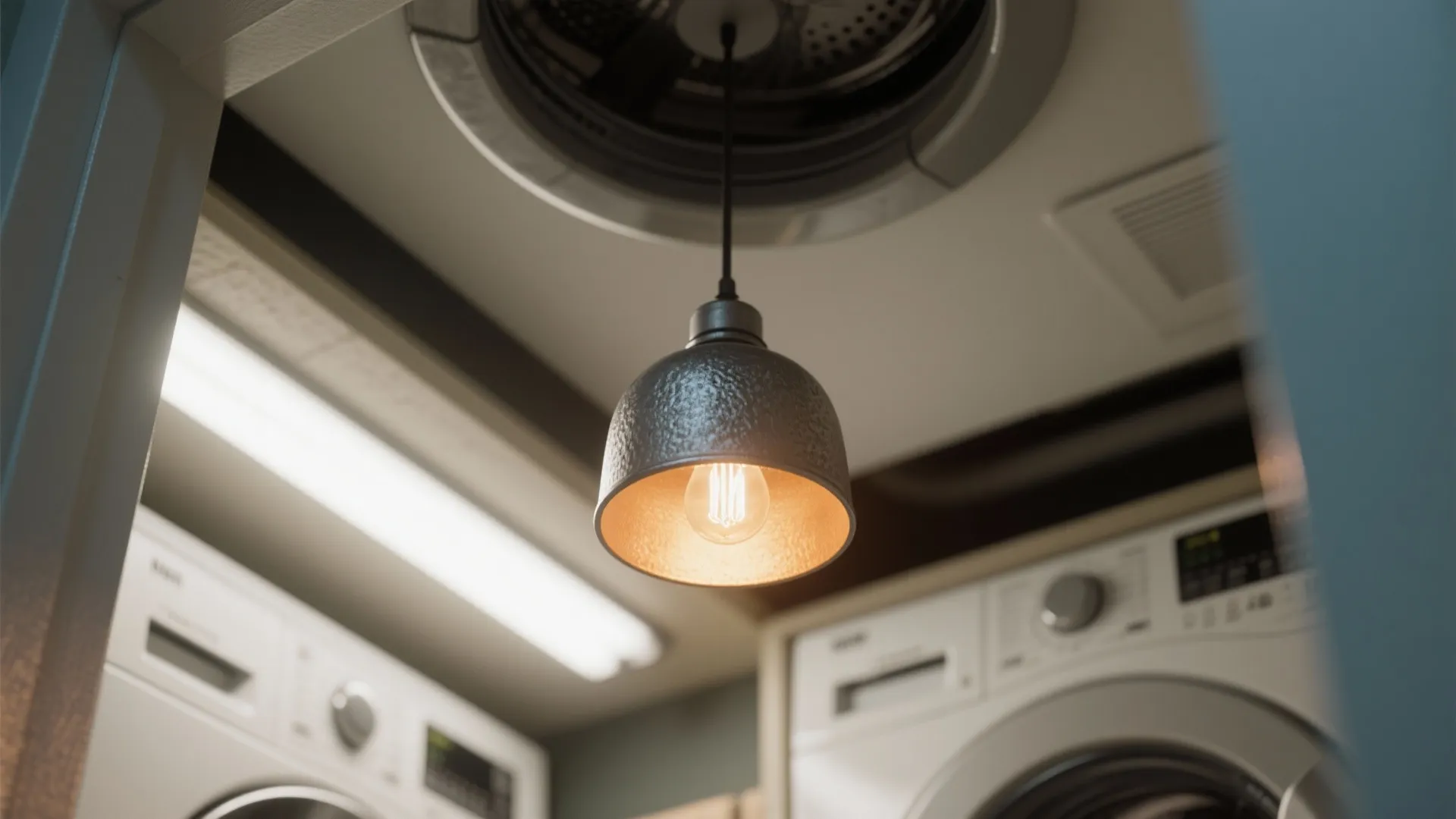 5. Damp-rated sconce or pendant for style with function