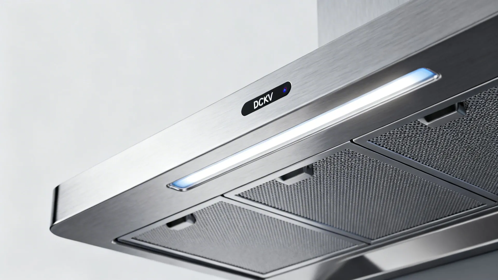 Close-up of a kitchen hood with DCKV sensor and clean baffle filters.