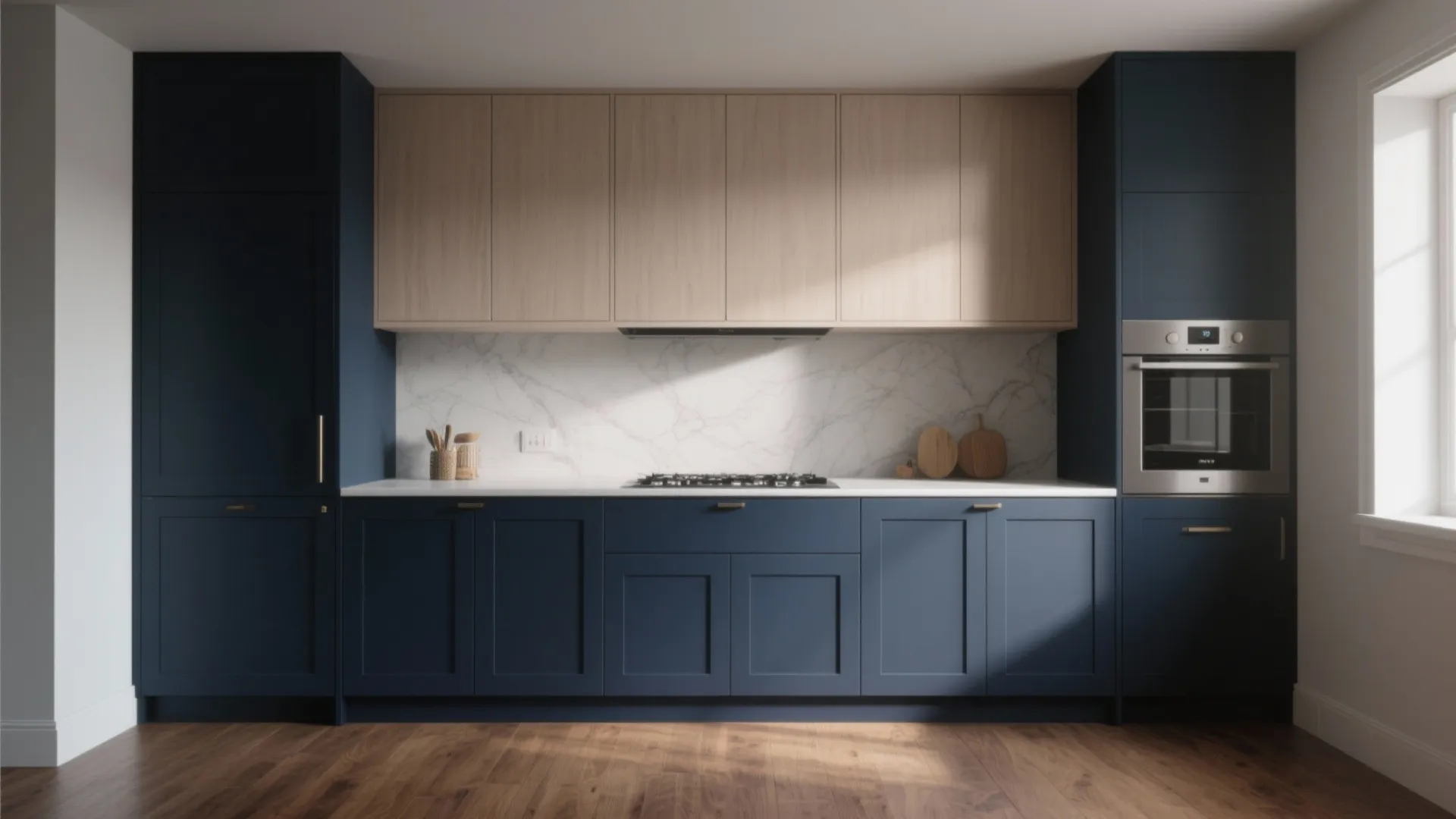 Modern kitchen featuring dark blue lower cabinets light wood upper cabinets and white marble wall backsplash