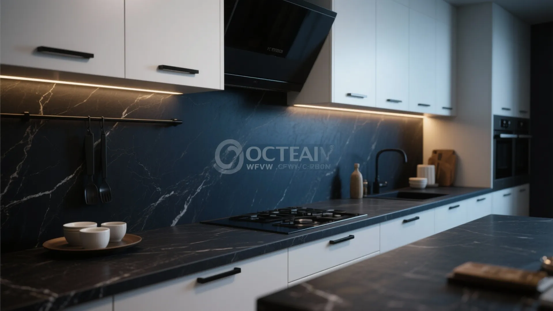 Crisp white cabinets contrasted with a deep navy honed countertop and matte black hardware.