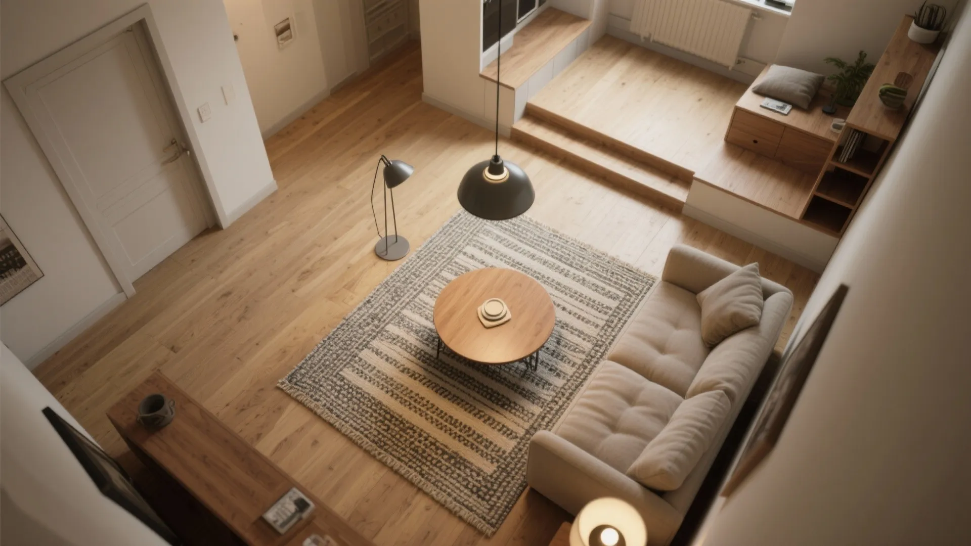 High angle view of a living room layout with rug sofa round table and light