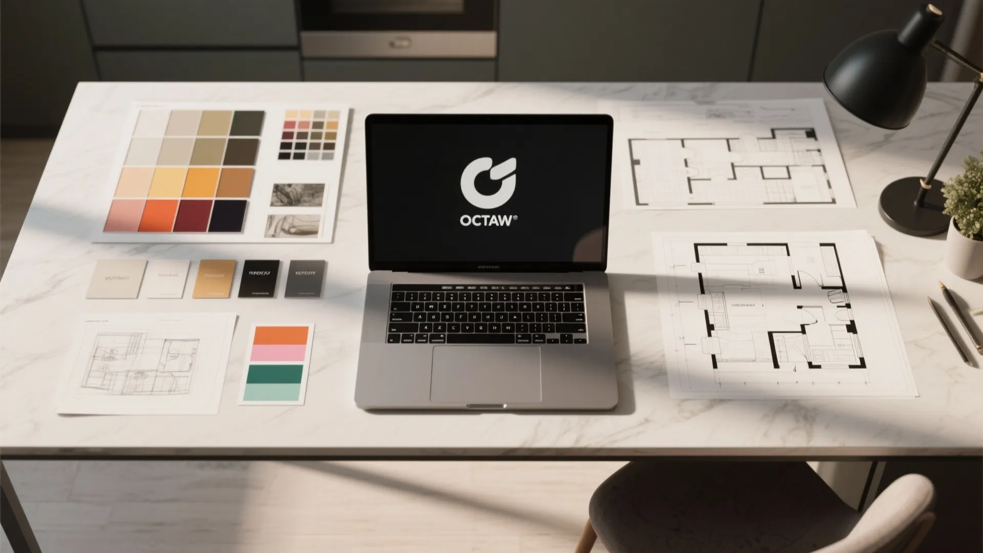 Top-down view of a moodboard, swatches and a laptop showing a kitchen floorplanner