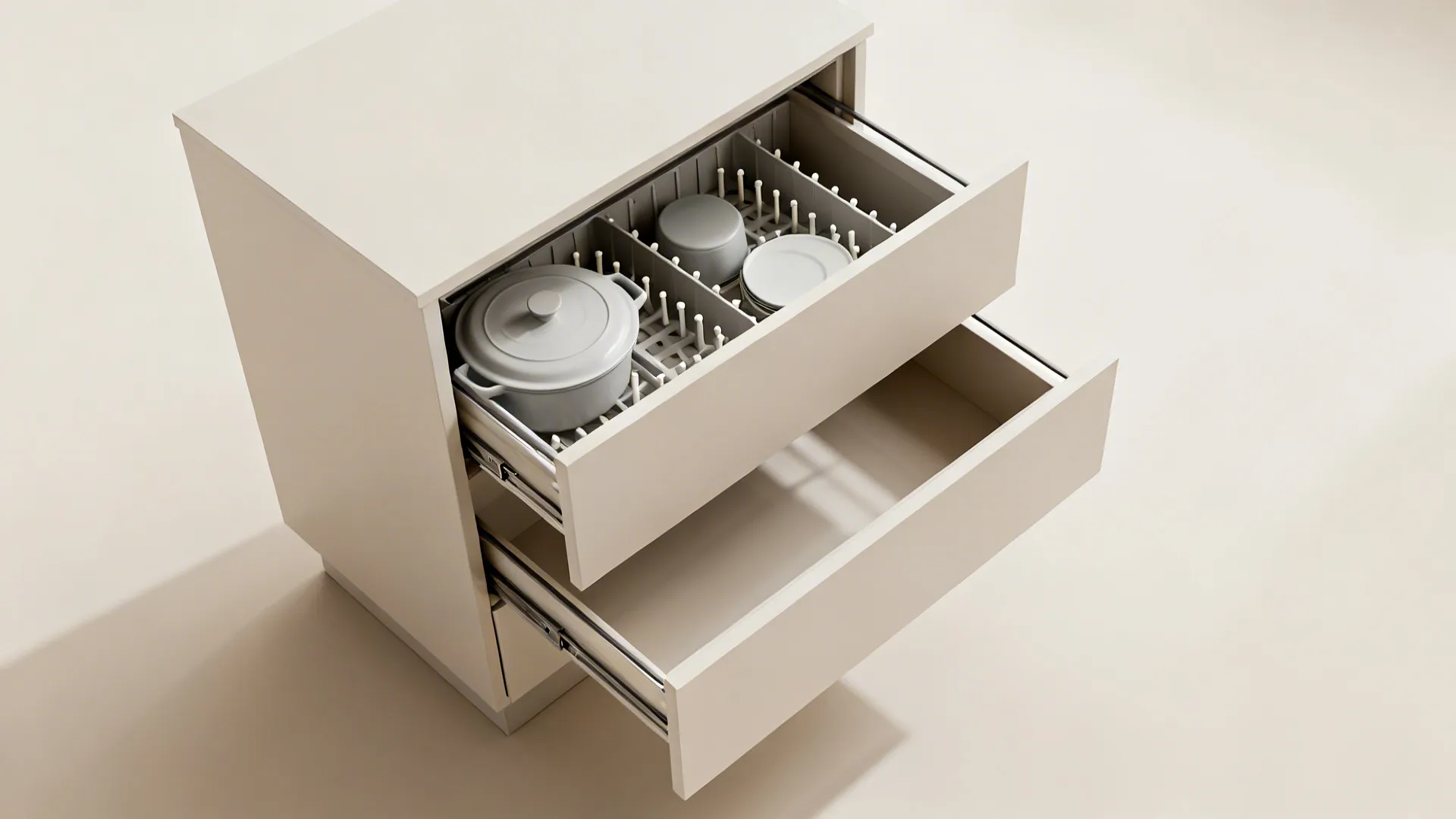 Top-down view of a base cabinet with two deep drawers and one shallow drawer using dividers.