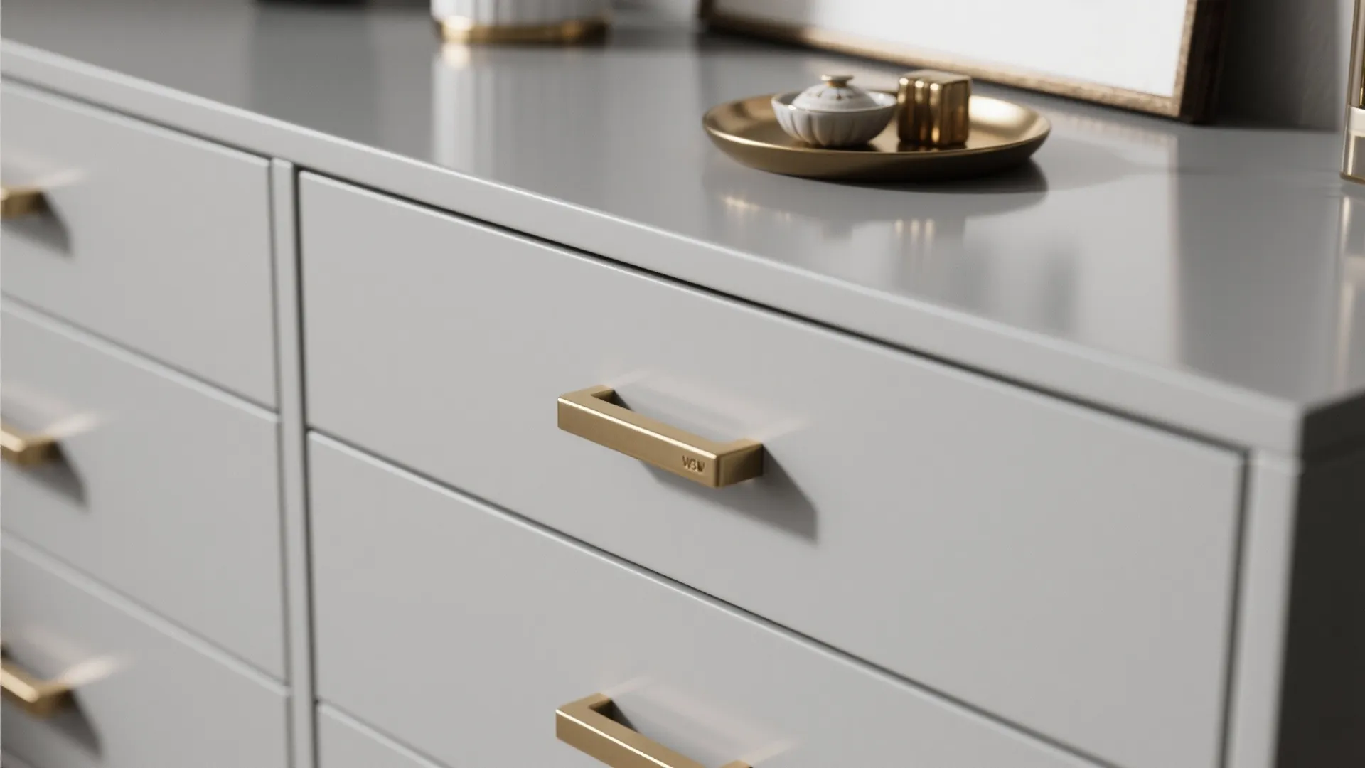 5. Sleek grey dresser with statement hardware
