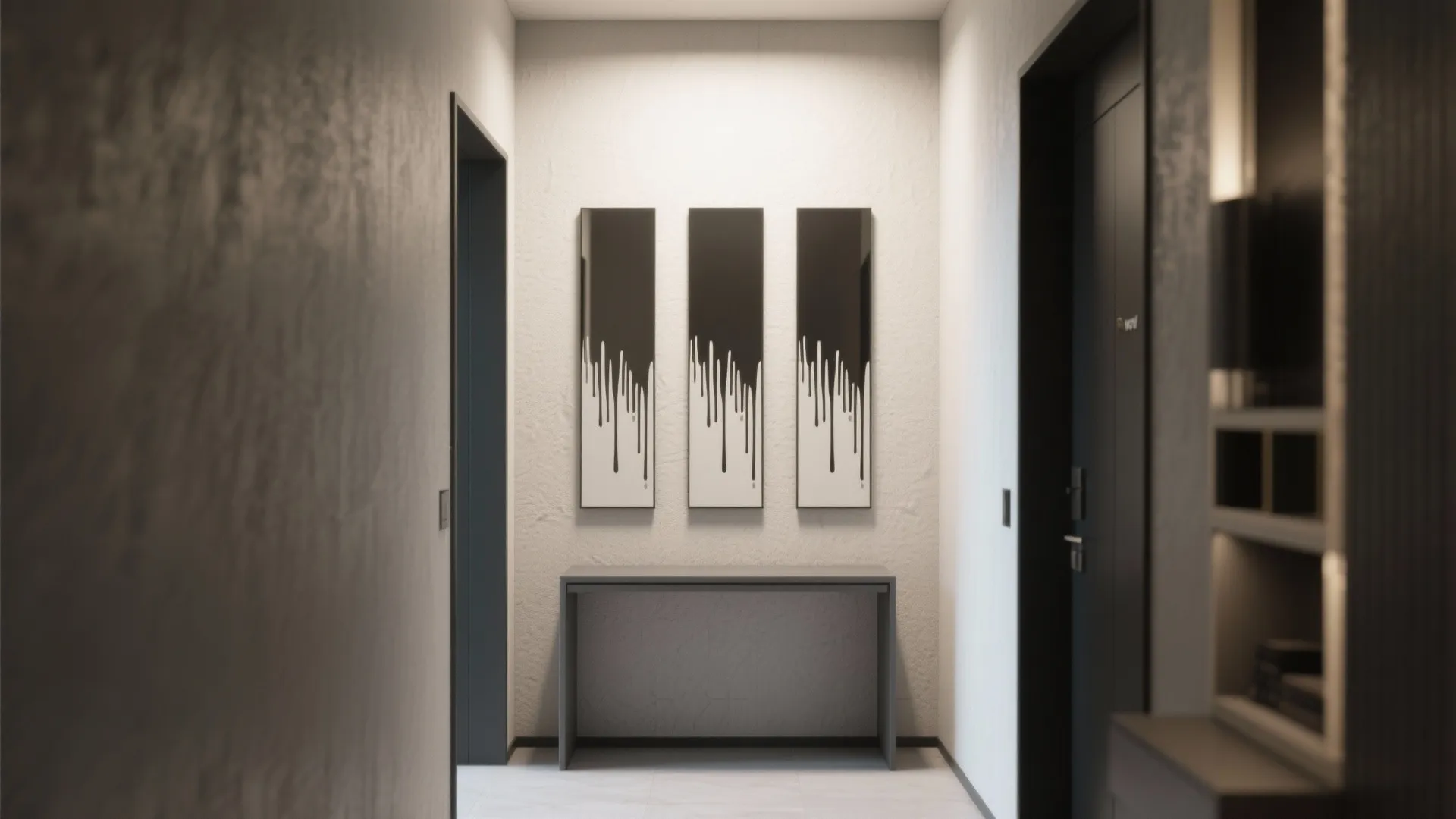 Modern hallway with three black and white drip art wall panels above a grey cabinet