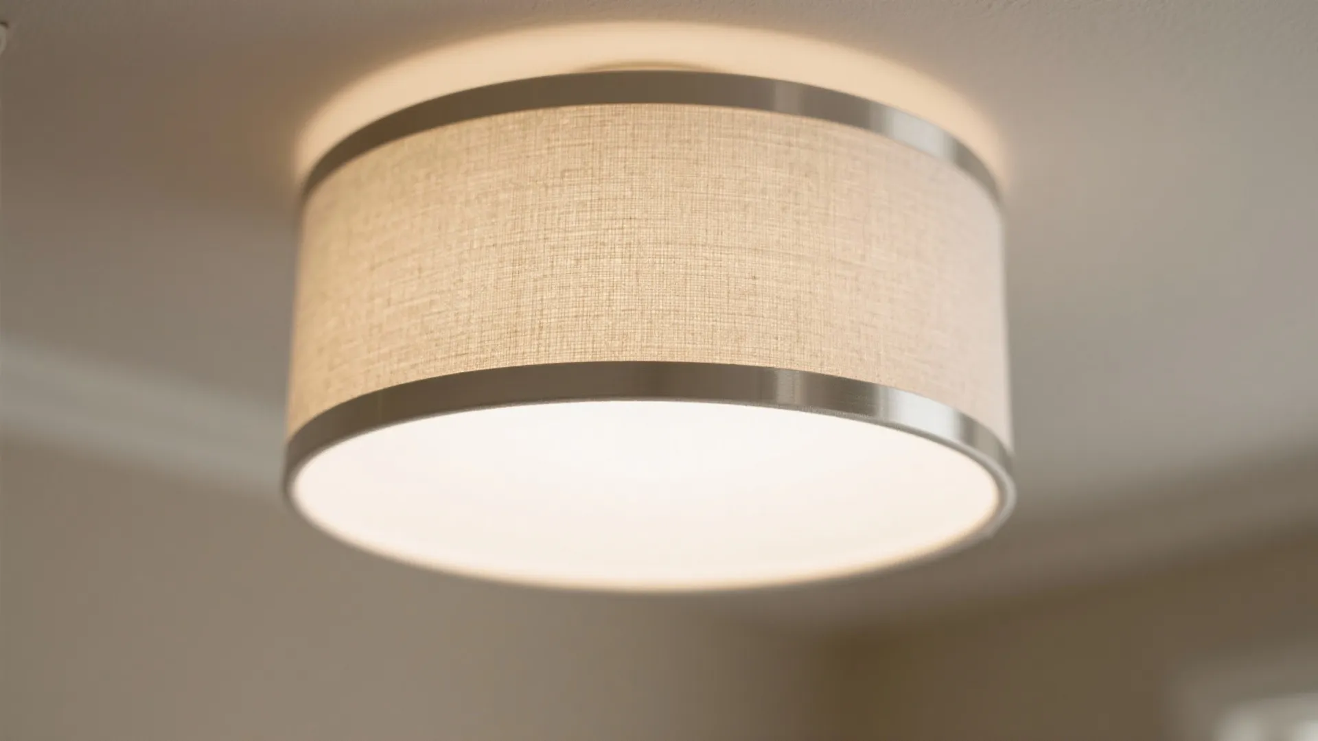 Flush-mount drum with fabric diffuser for cozy, modern softness