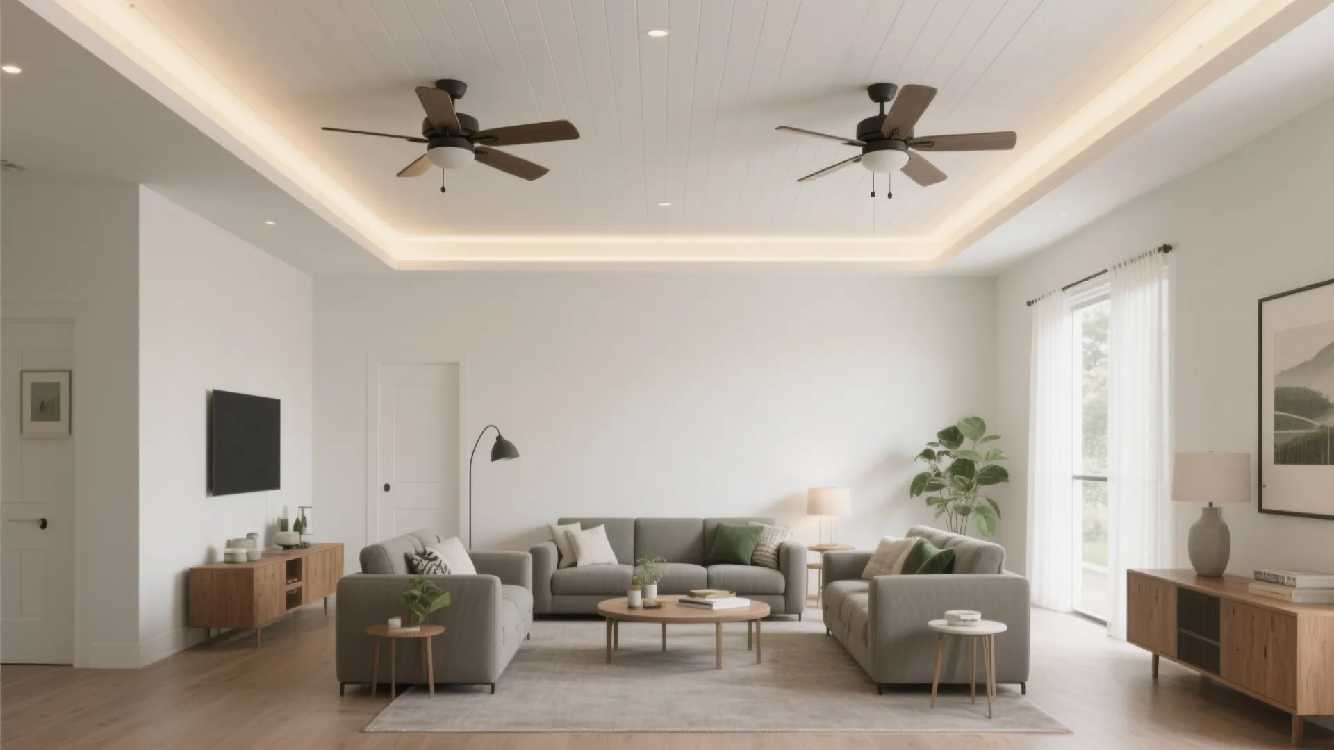 Modern bright living room with grey sofas wooden tables white walls and two ceiling fans