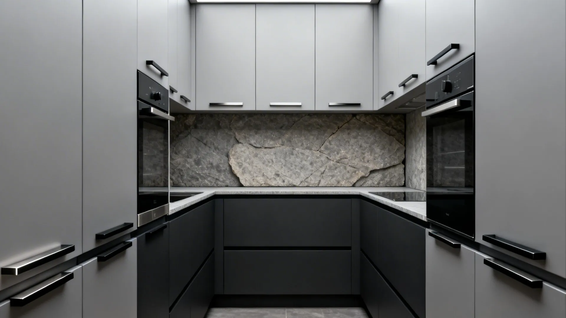 Minimalist slab cabinets with slim edge pulls letting the stone backsplash stand out.