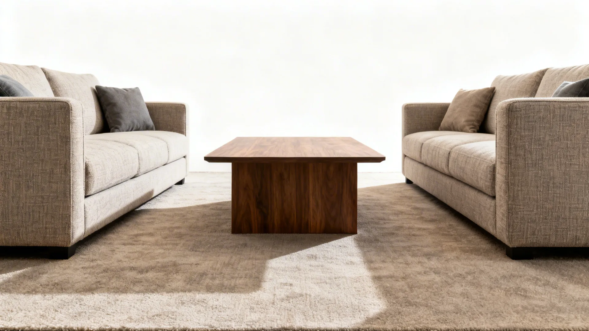 Two sofas facing each other with a coffee table centered, creating a conversation area