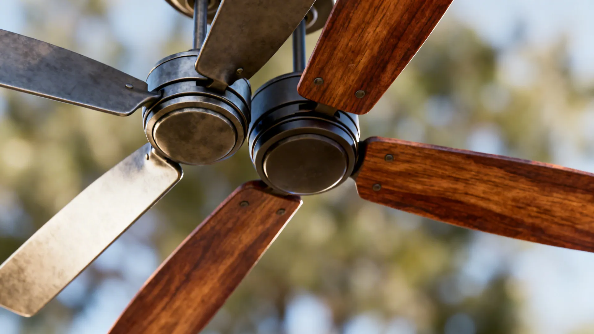 Close-up of different ceiling fan blades showing pitch and blade count variations