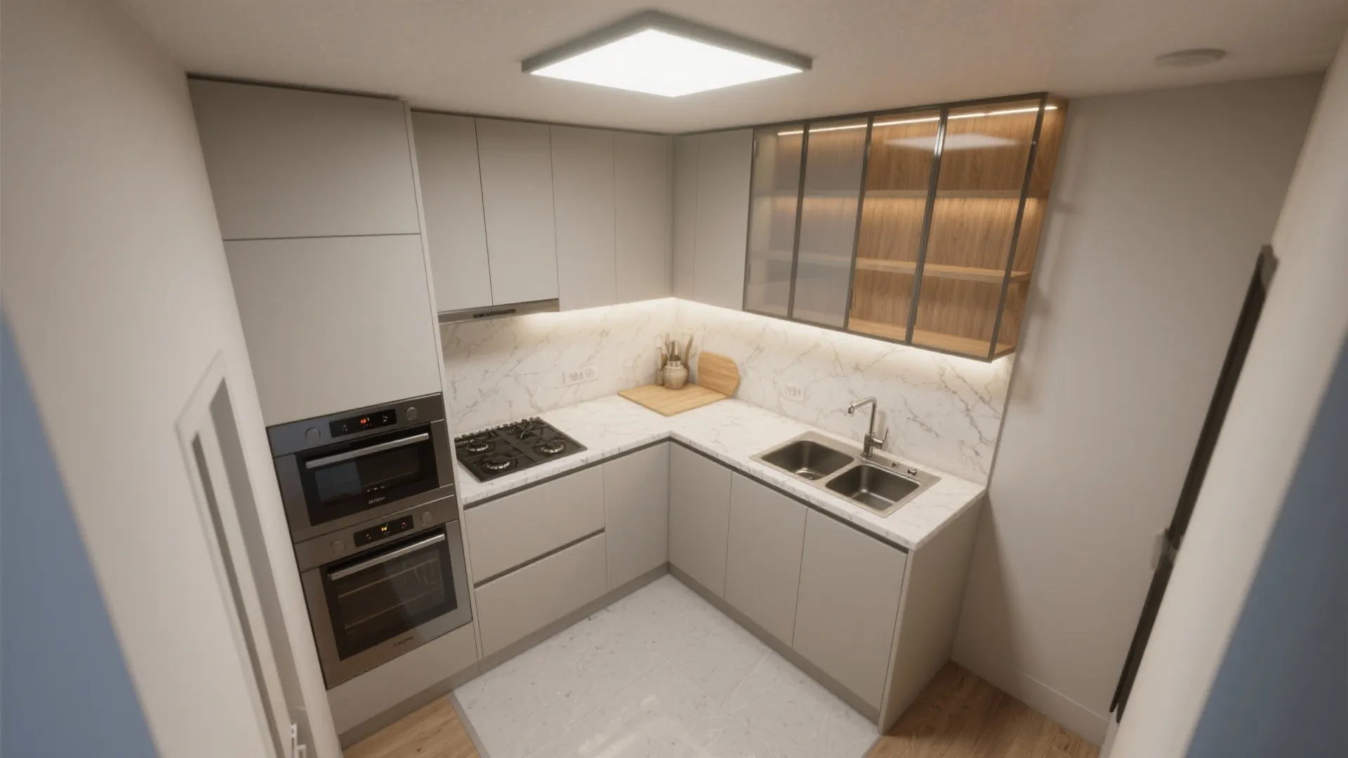Small apartment kitchen design with grey cabinets marble backsplash double sink and built in oven