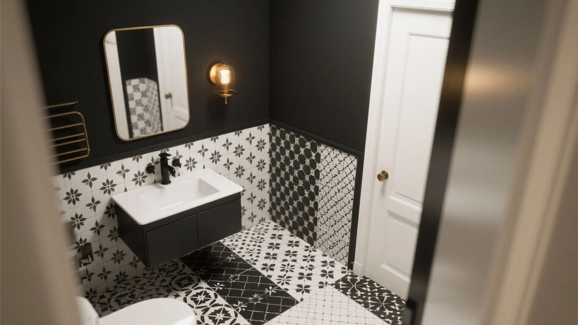 Small bathroom featuring black and white patterned tiles wall light fixture mirror and dark cabinet