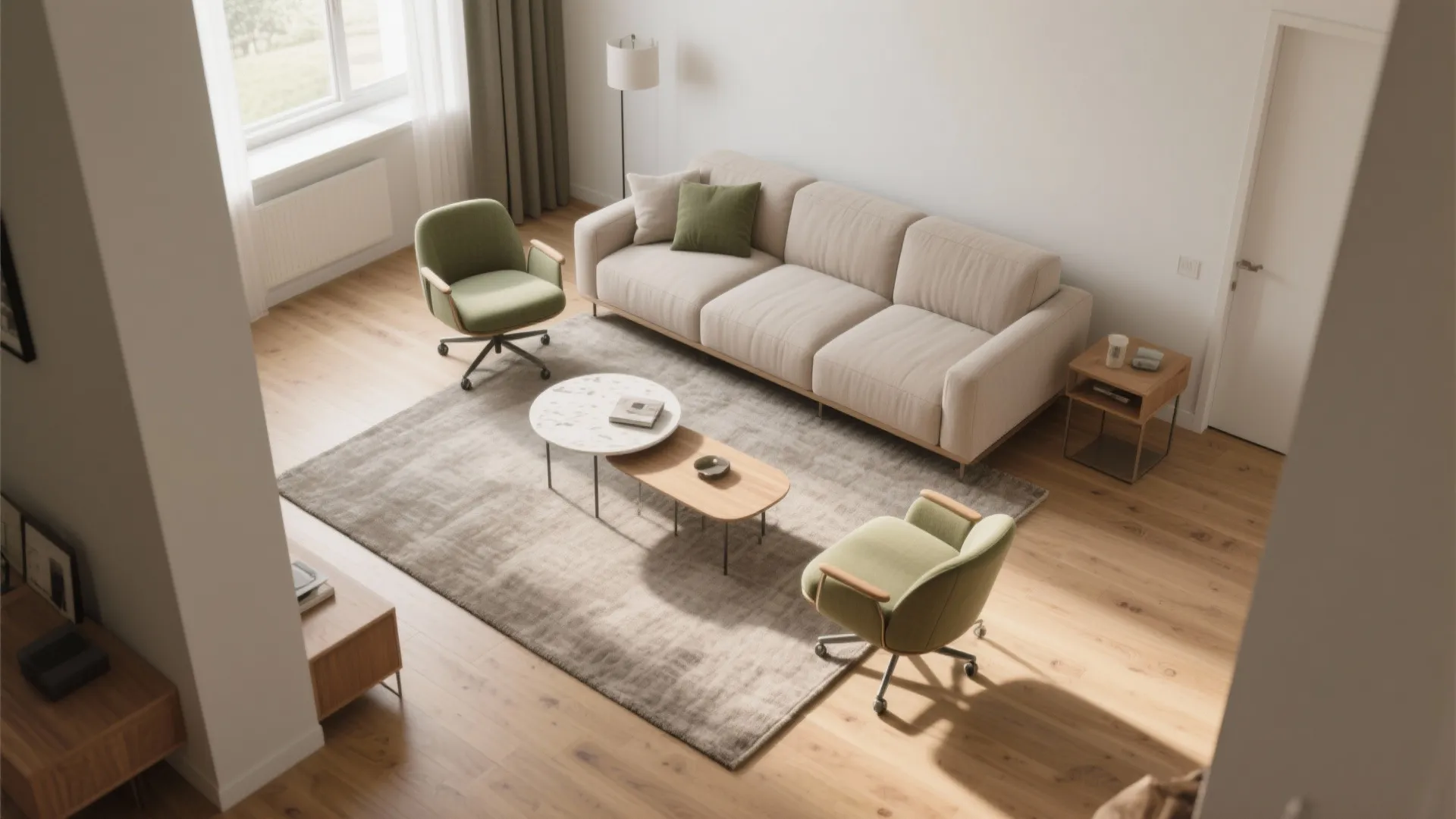 High angle interior design drawing showing a beige sofa green chairs and wood coffee tables