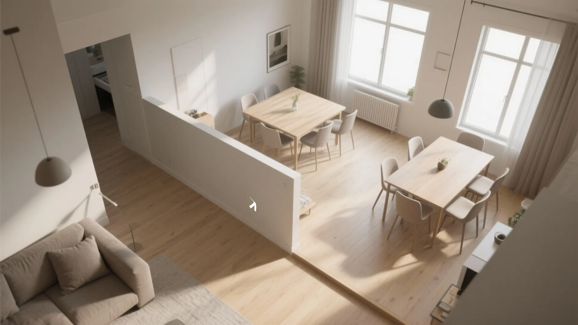 Open plan home interior design showing two dining tables and a sofa with natural light