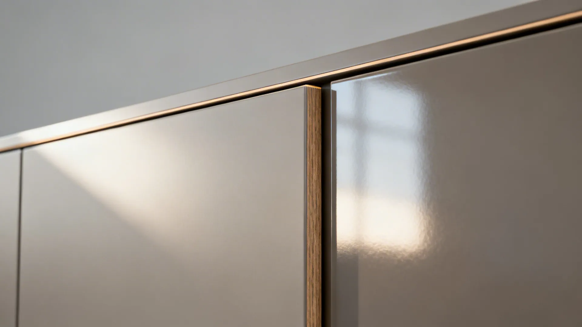 Macro comparison of semi-matte and glossy cabinet finishes with realistic reflections.