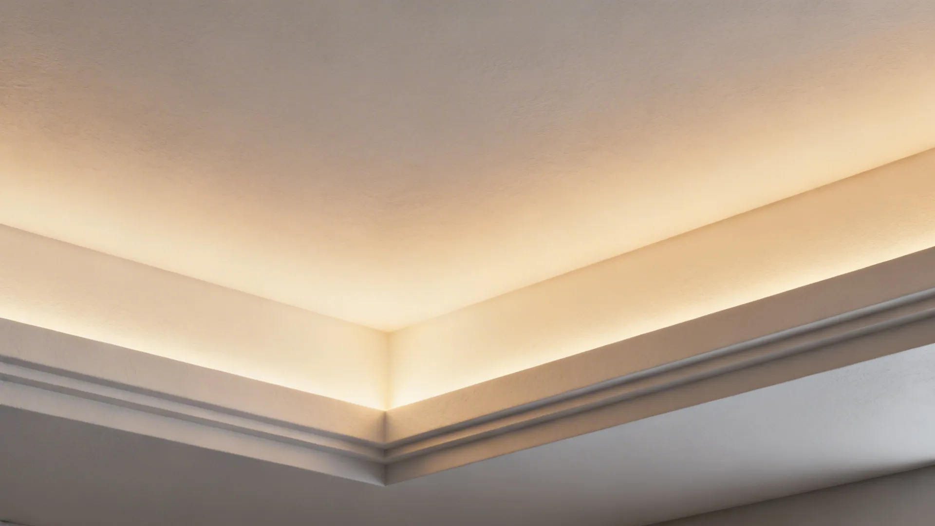 Recessed cove ceiling with hidden warm LED strip producing a floating ceiling effect